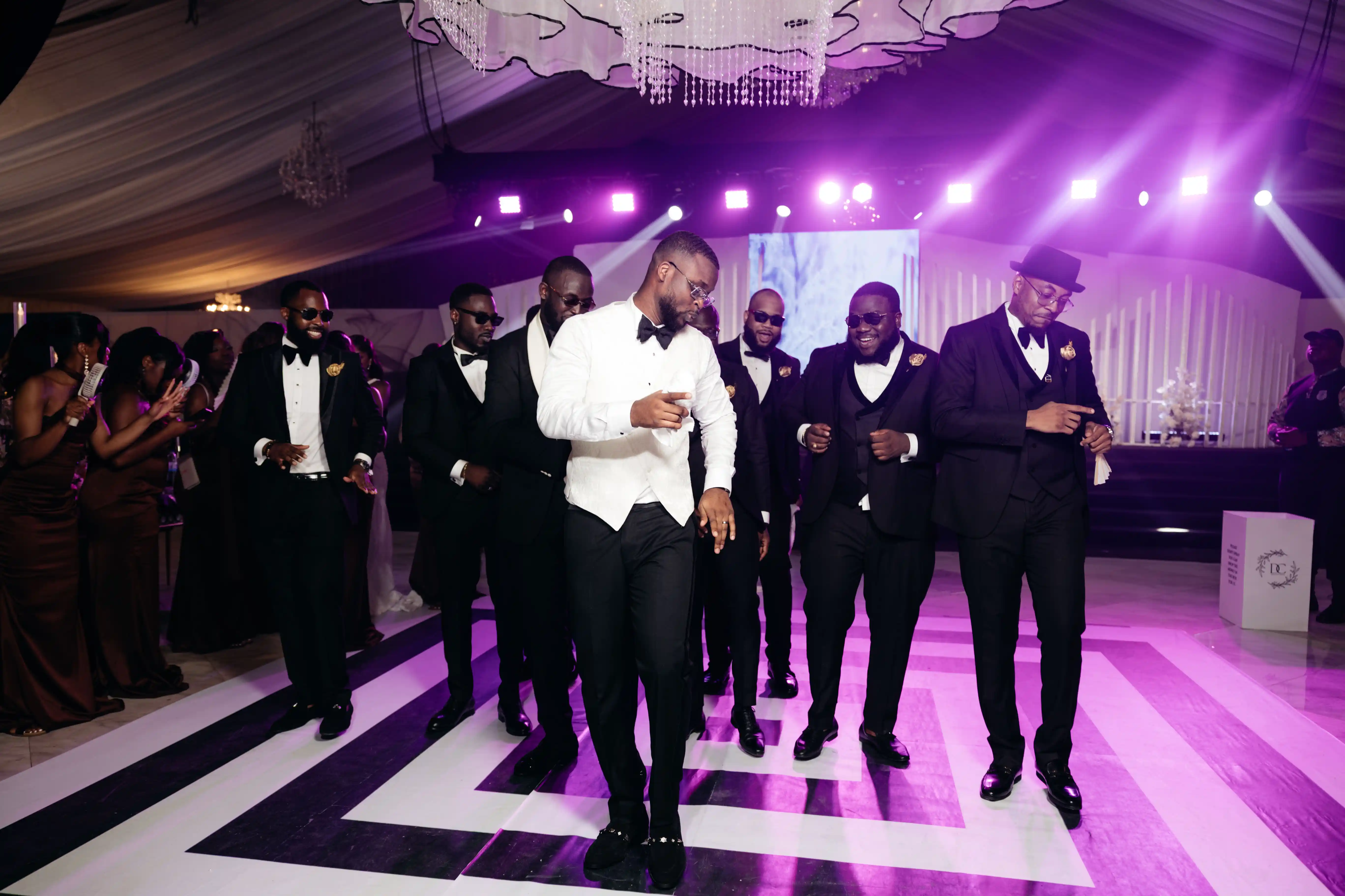 Bride and groom celebrating a luxury wedding coordinated by Victoria Brooks Events, a premium wedding planner in Nigeria.