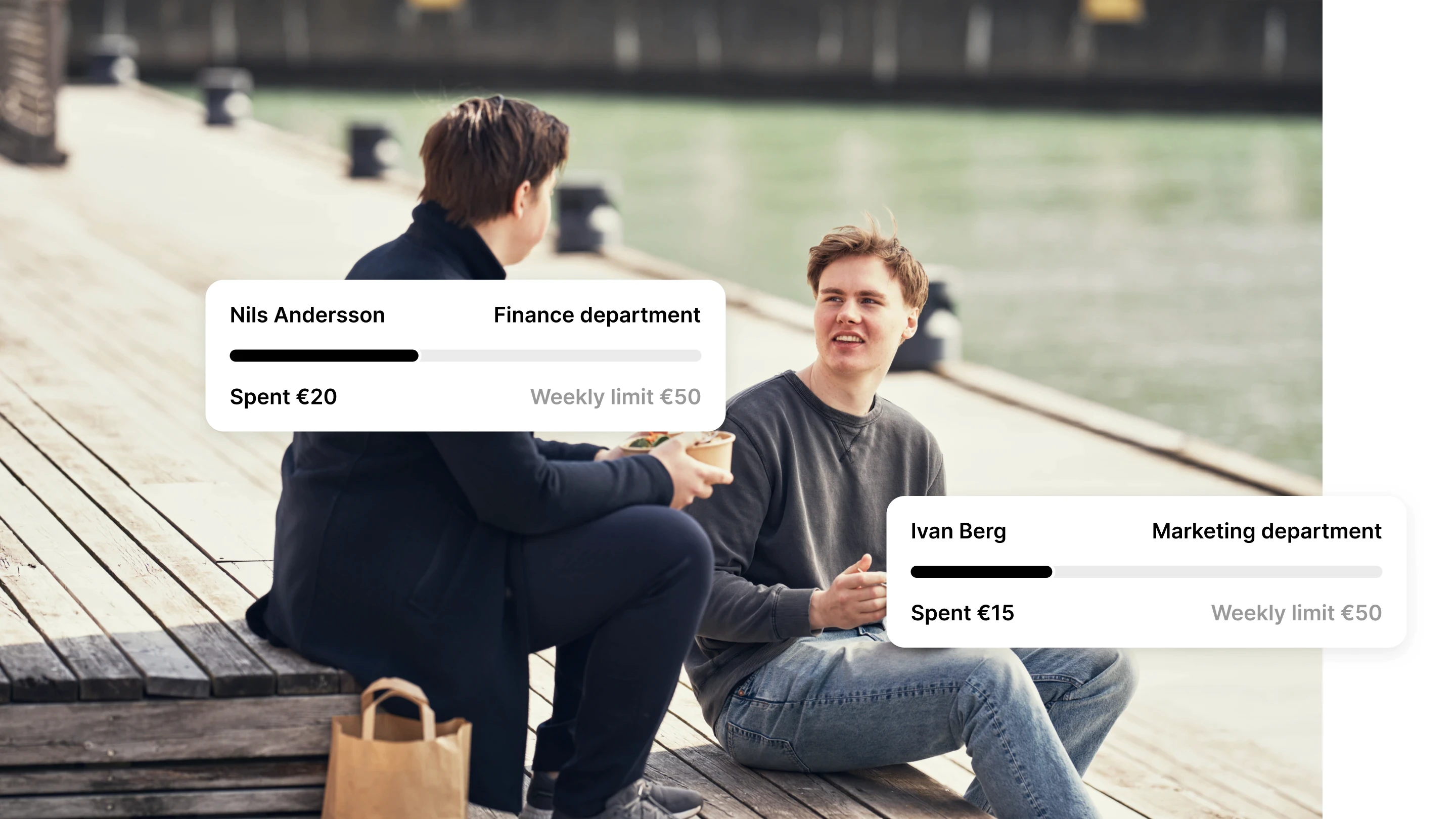 Two men on a dock with food and UI of food benefits