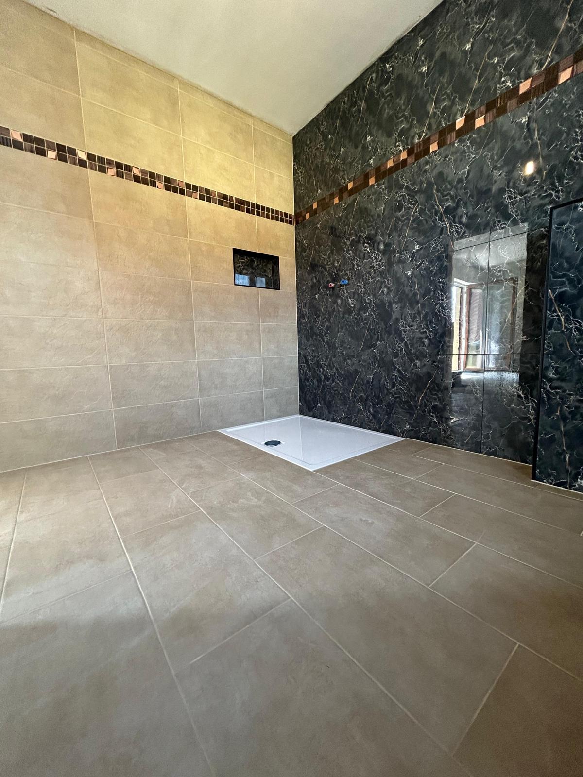 Contemporary sustainable architecture with a series of cantilever apartments incorporating natural wood elements and vibrant greenery