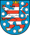 Wappen des Bundeslandes Hessen: Gestreifter roter und weißer Löwe auf blauem Schild.