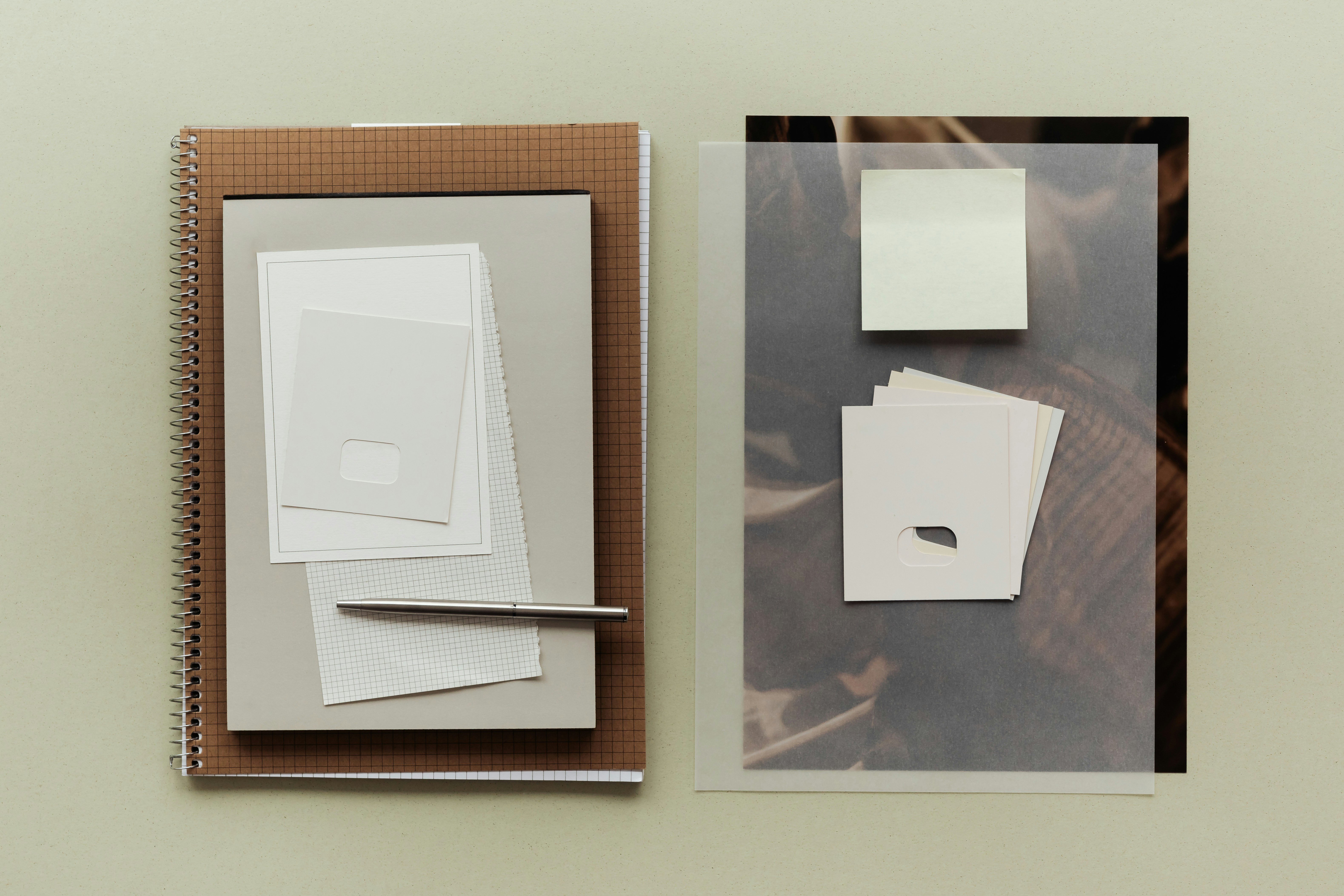 Notebooks, paper and writing materials as a symbol of warehousing and fulfilment for publishers and booksellers.