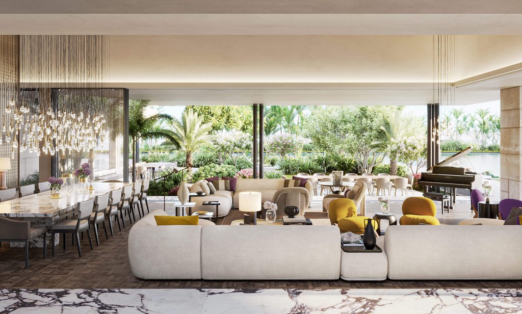 Stylish hotel lobby in Dubai with a large dining area, showcasing modern architecture and inviting ambiance.
