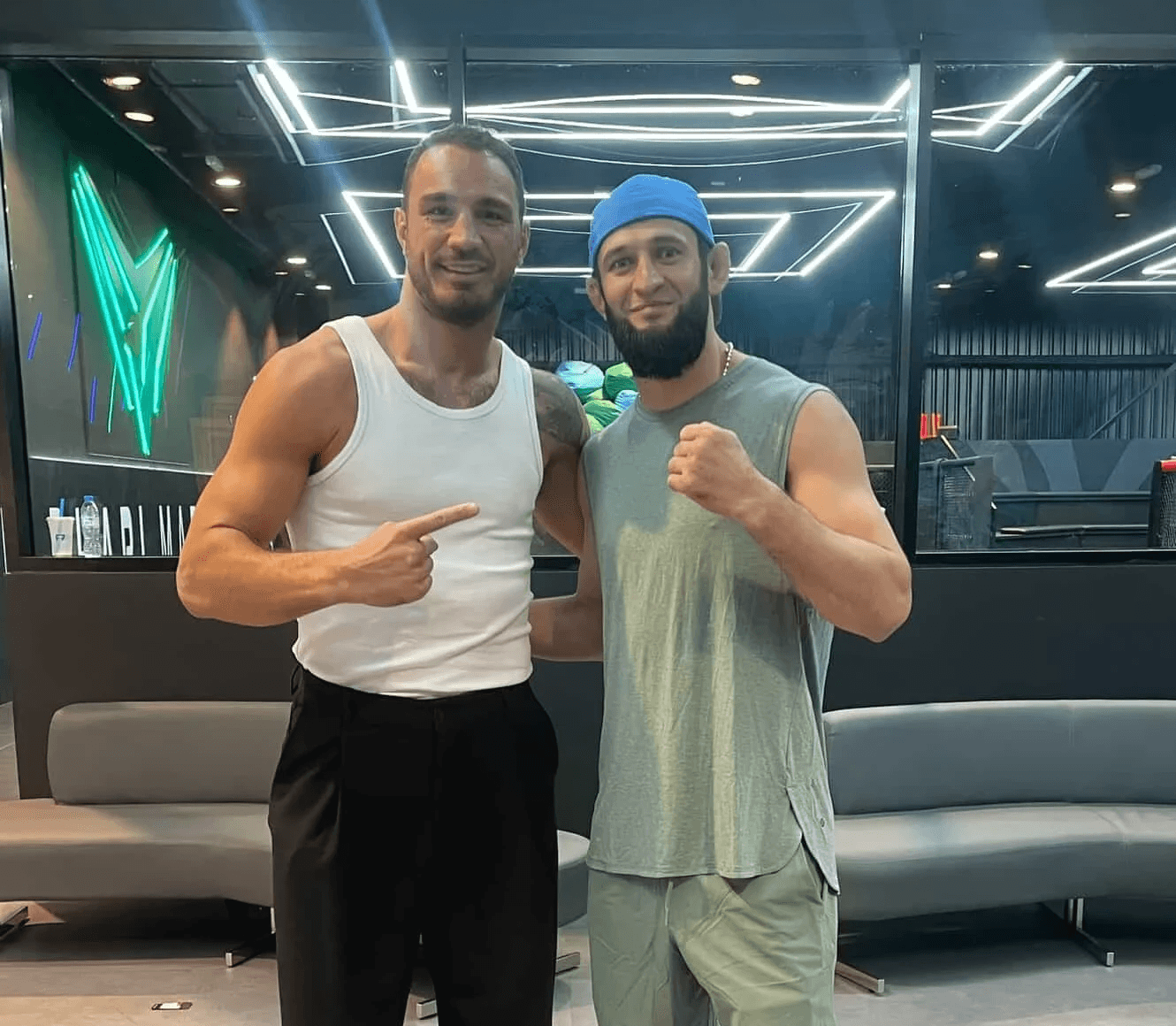 Boxing coach Agron Smakici posing with Khamzat Chimaev after a training session in dubai.
