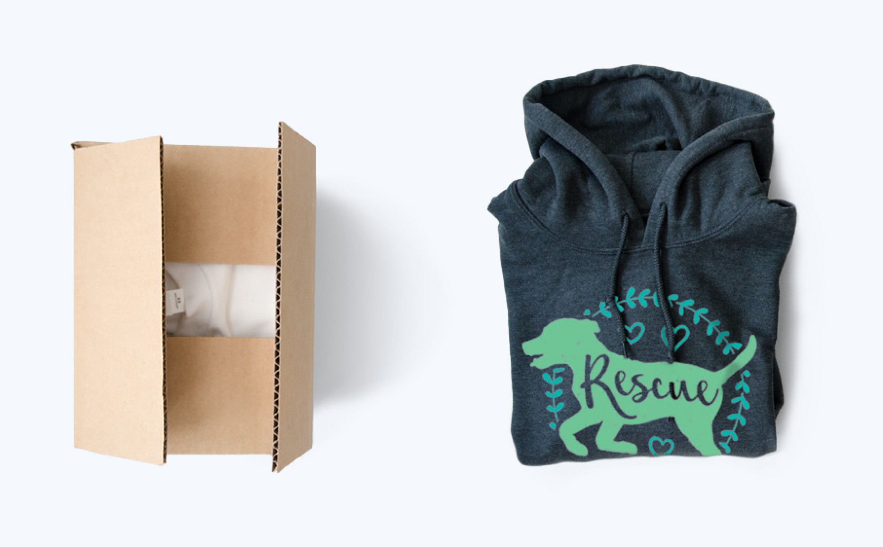A dark gray hoodie with a teal dog and the word "Rescue" printed on it, next to an open brown shipping box.