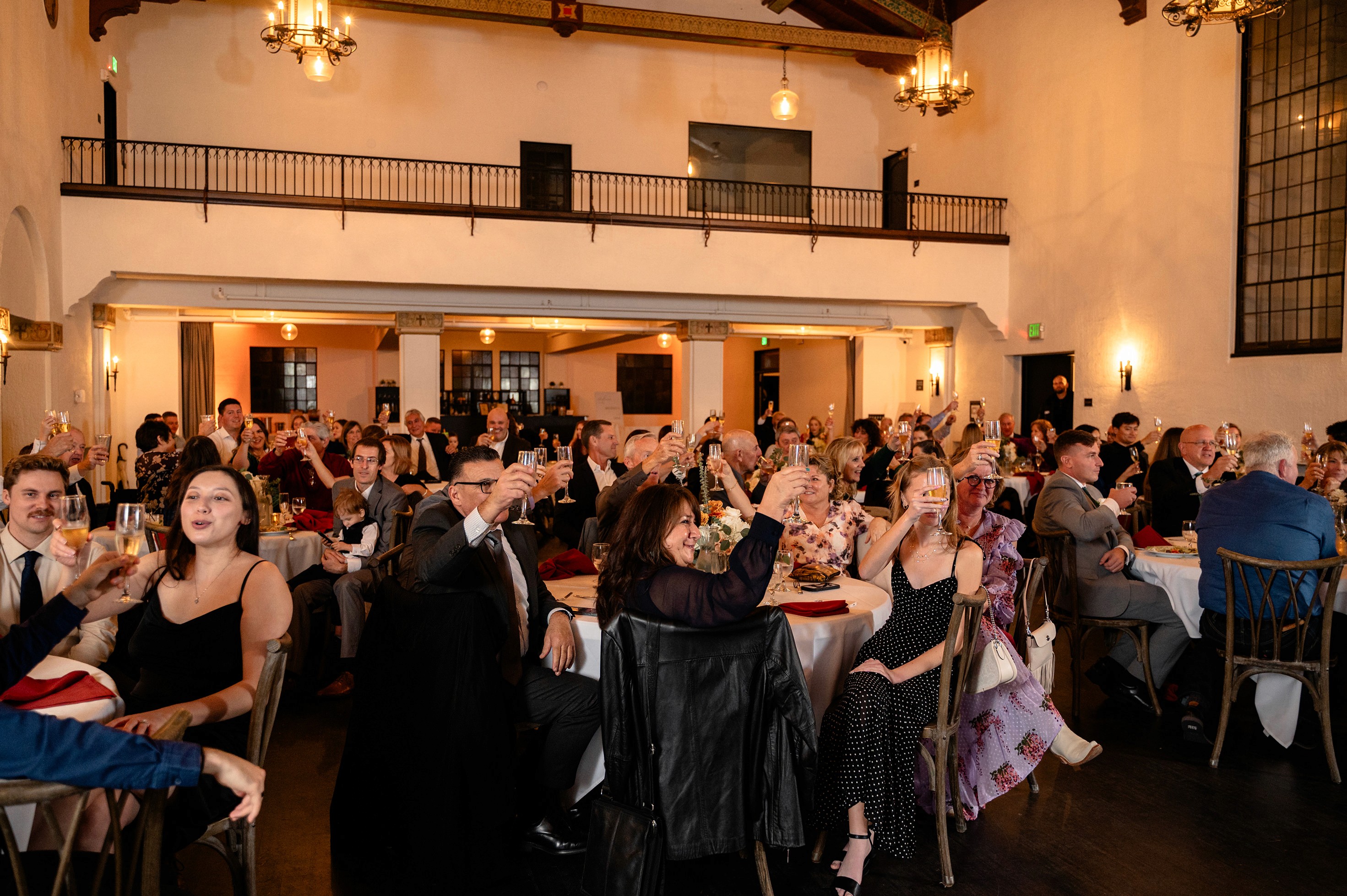 Flat lay wedding details with bouquet, rings, and sparkling bridal heels
