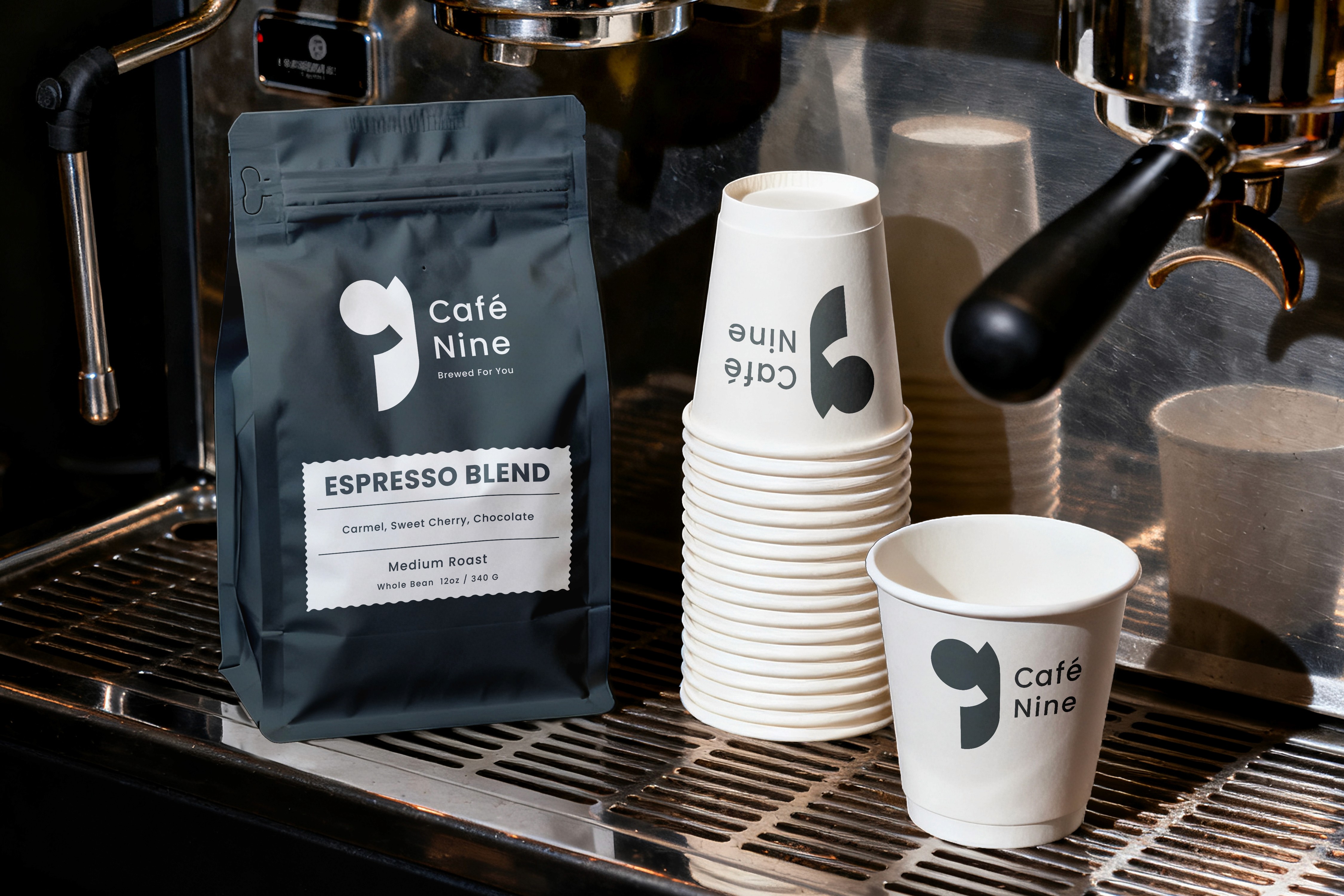 Coffee bag and cups on espresso machine