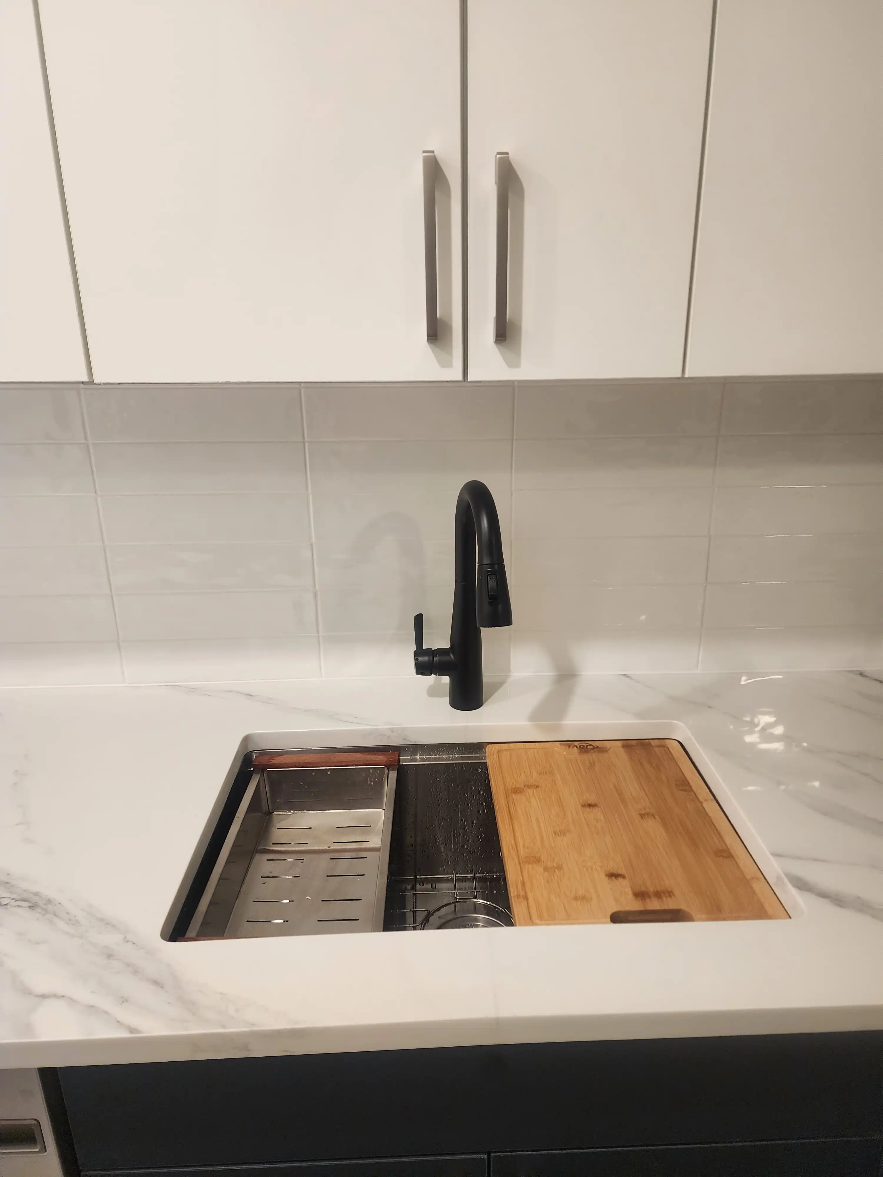 Custom Trex composite deck finished ceiling using Trex Rain Escape by Jewel Construction in Queens, NYC