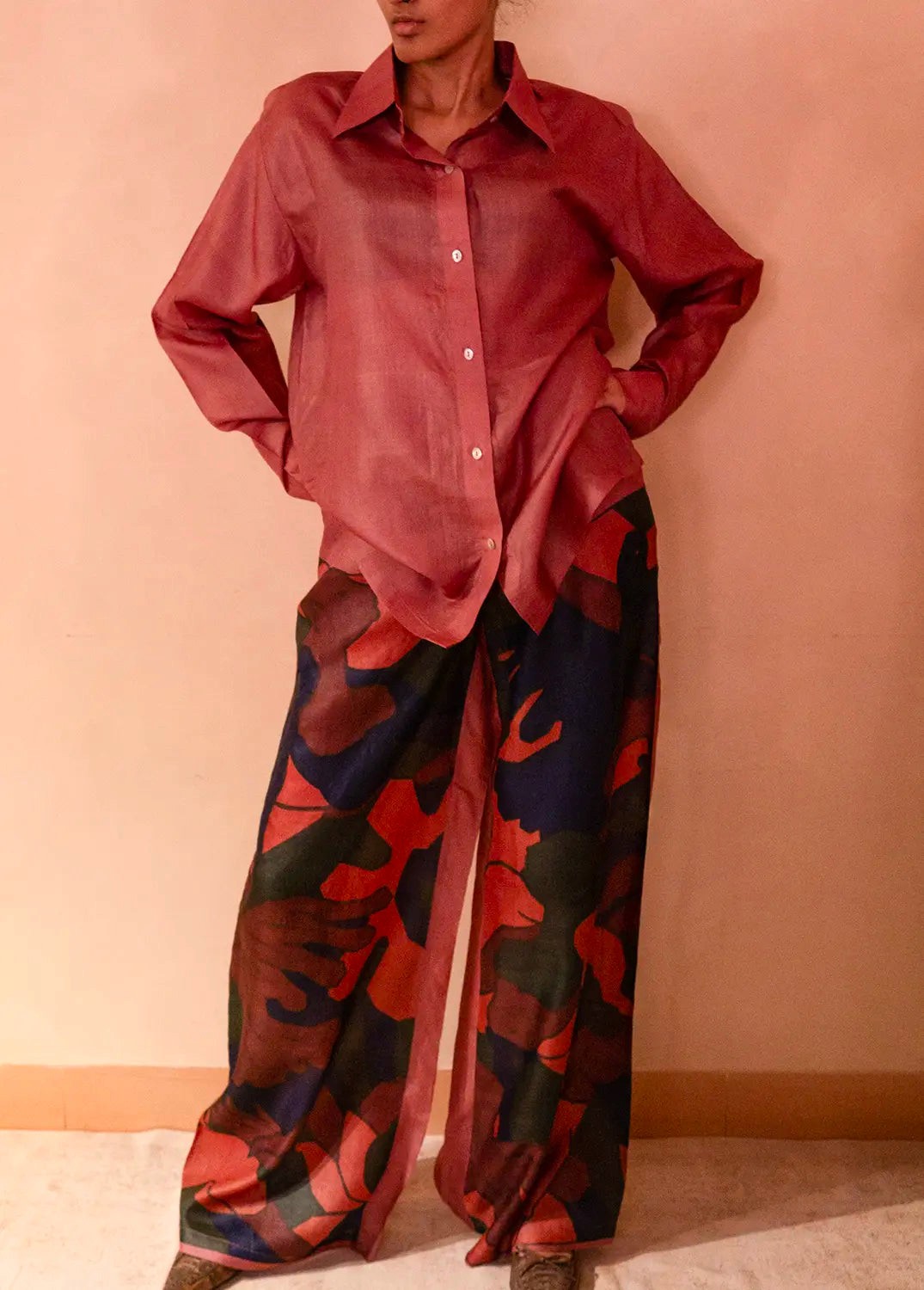 A relaxed co-ord set featuring a simple silk shirt, Designed for effortless wear