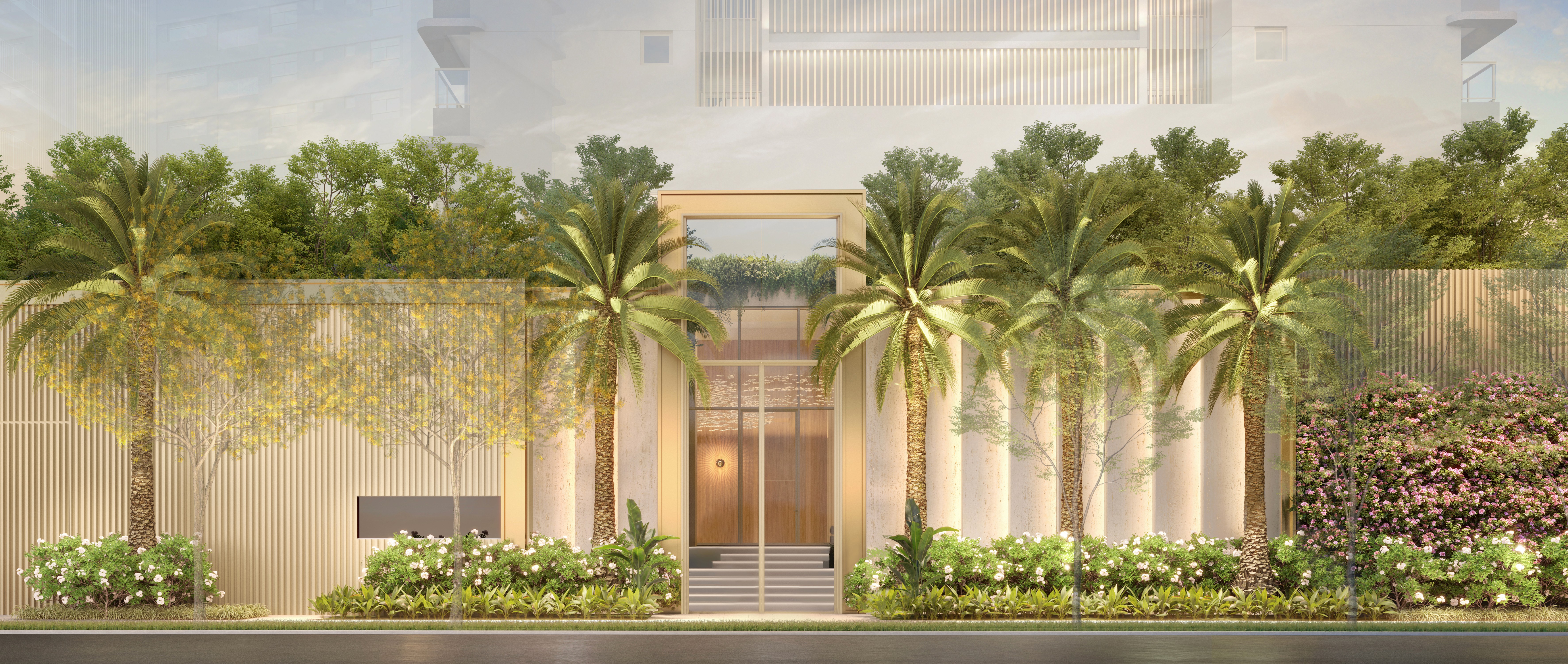 Curved modern skyscraper against a clear blue sky.