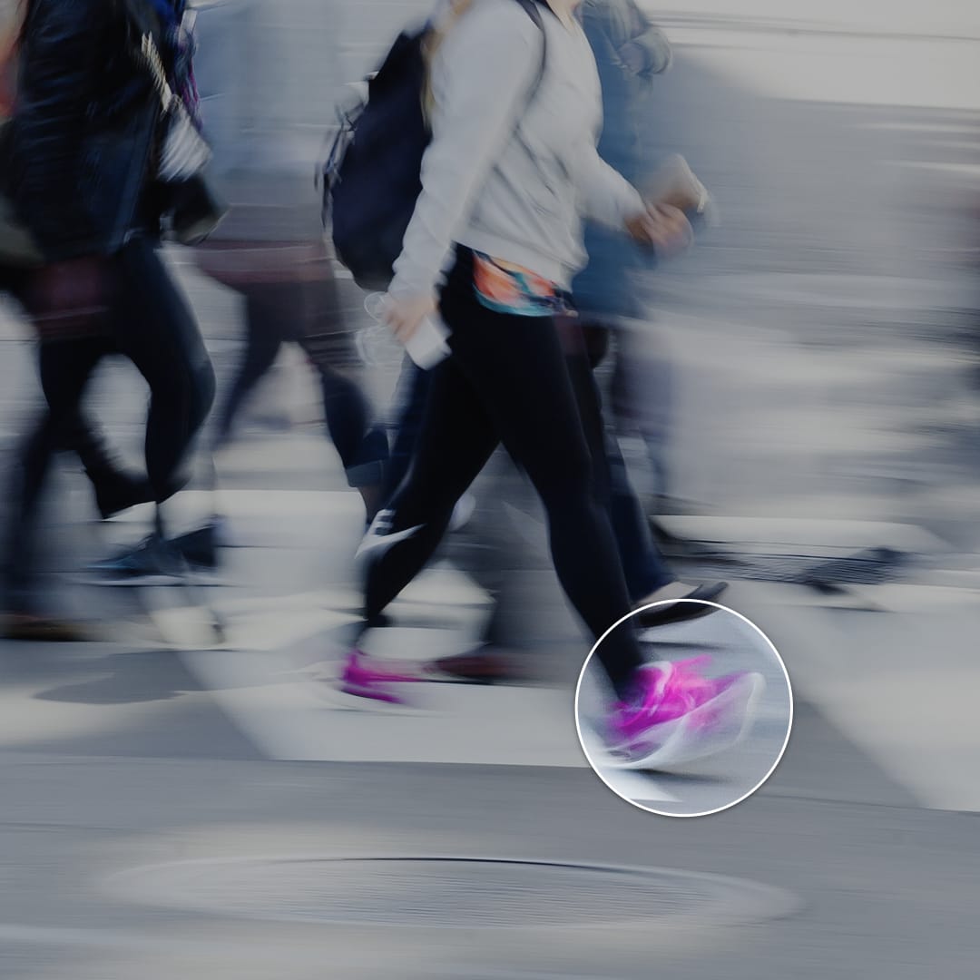 A busy street with an overlay that suggests computer vision