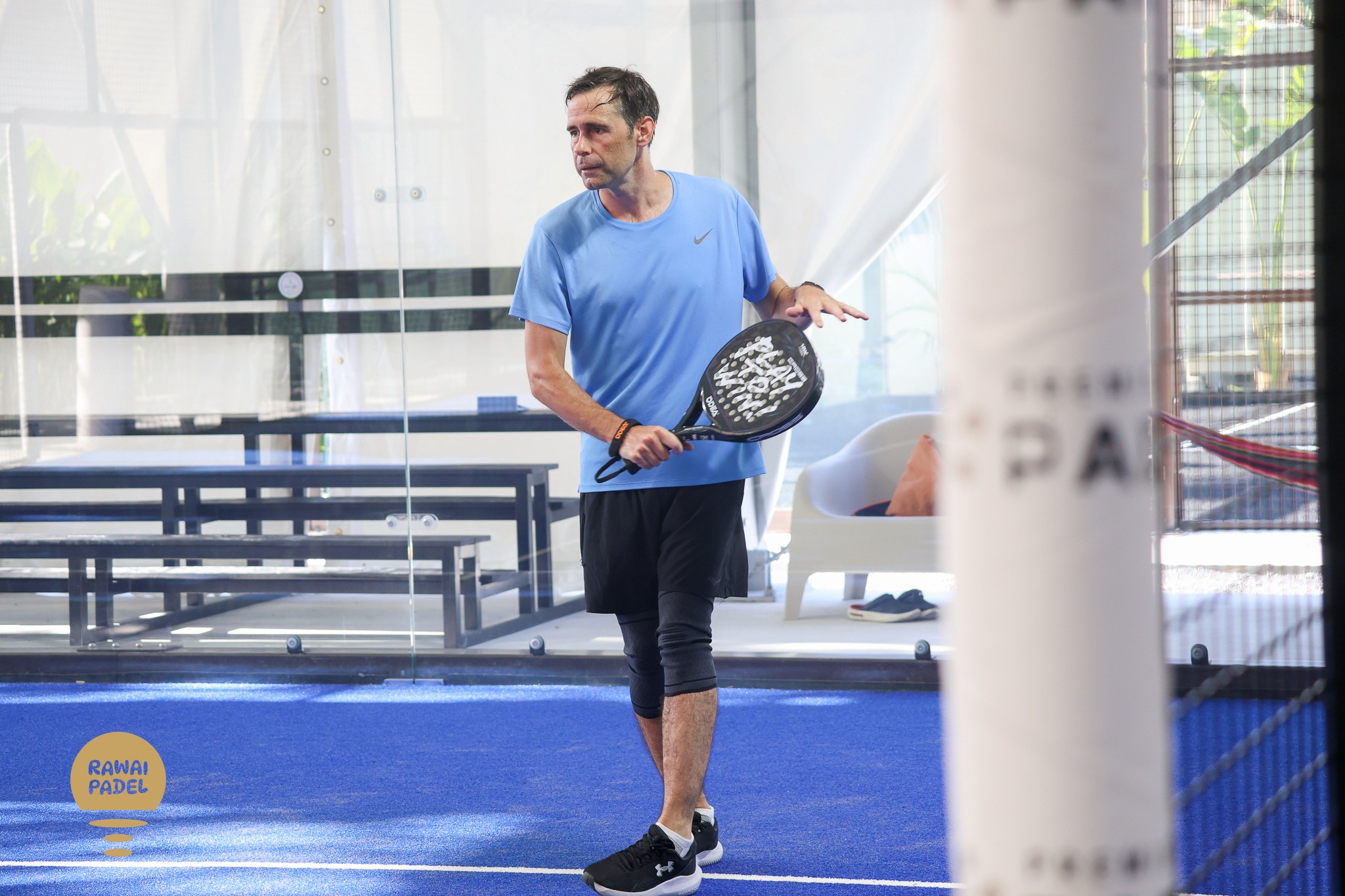two men playing tennis