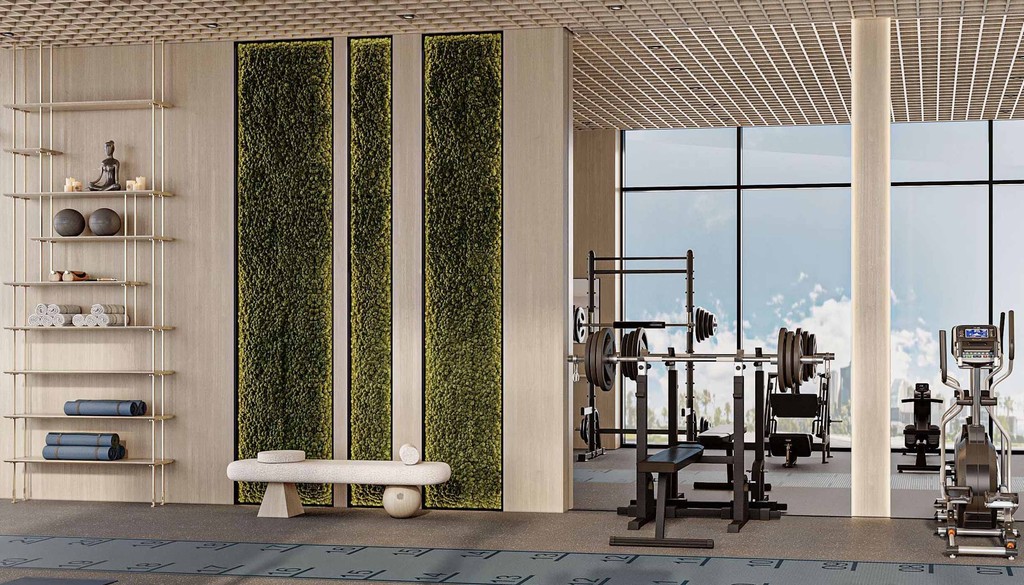 A gym room featuring a vibrant wall of plants, enhancing the space's natural ambiance in the Cove Edition 6 design.