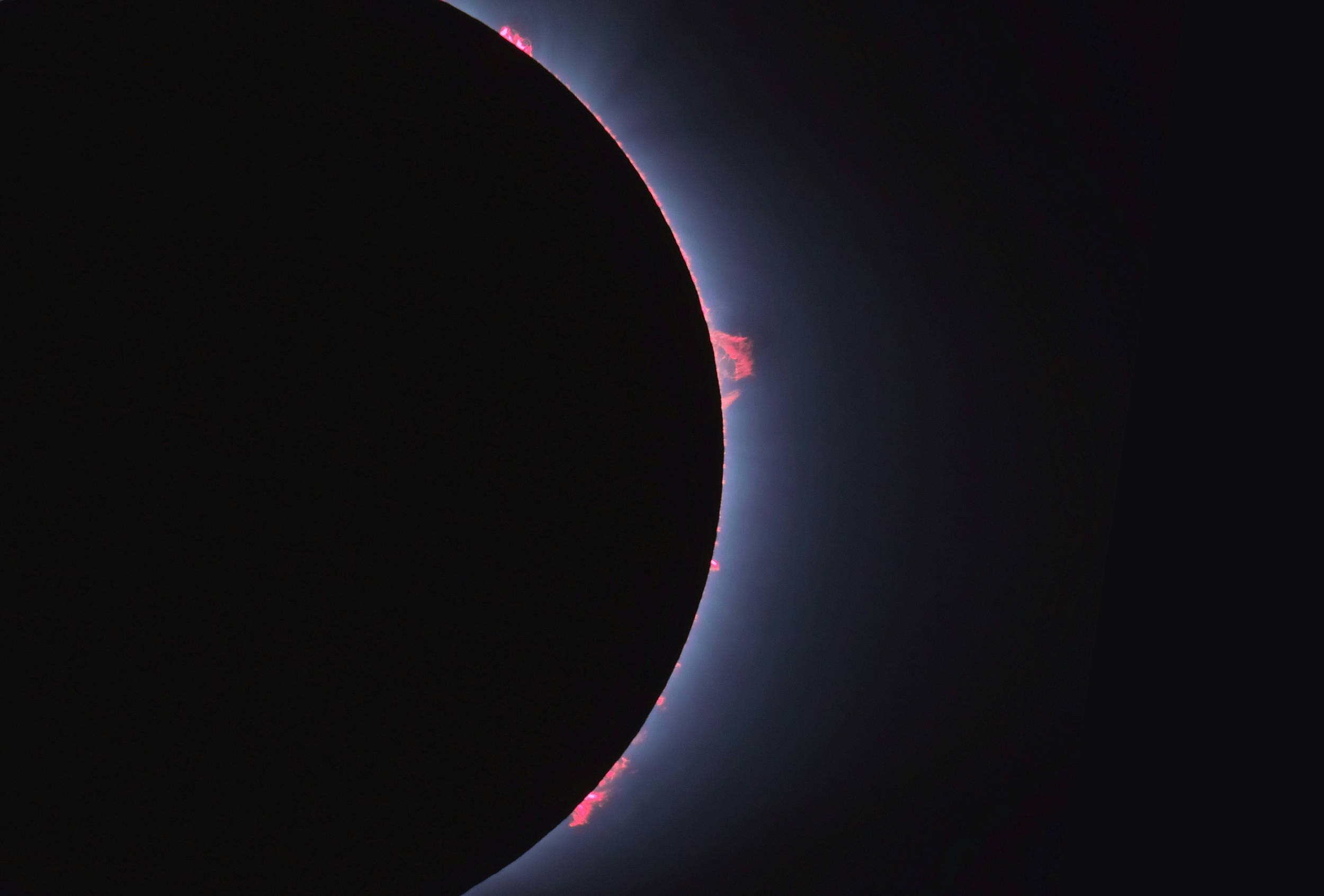 sun prominences during a solar eclipse