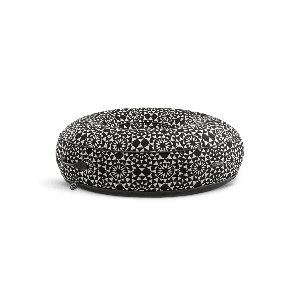 Ring-shaped luxury pool float in black-and-white geometric jacquard with leather trim