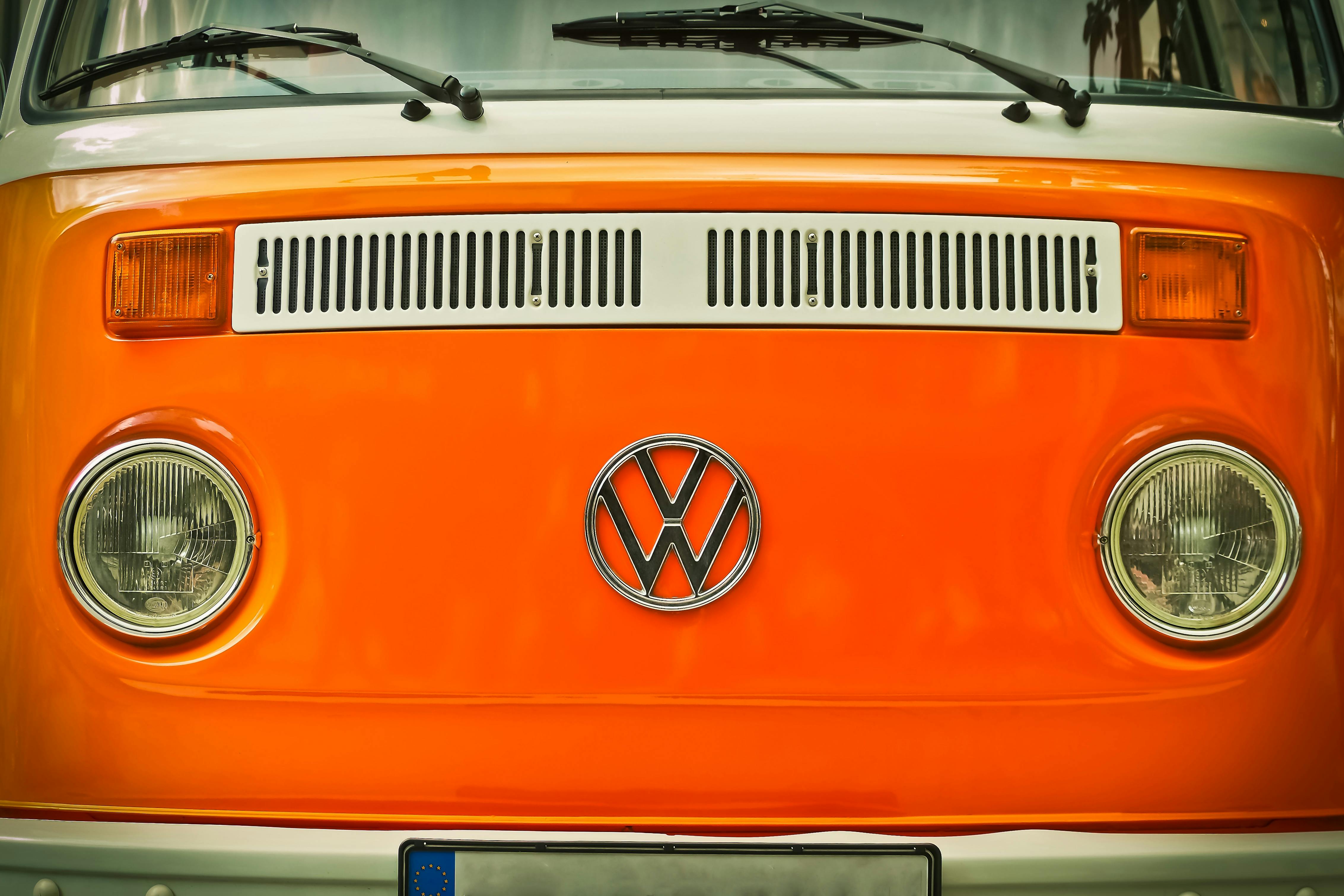 A volkswagen van seen from the front in bright orange, to demnostrate The Brand Strategy perspective on heritage brands meeting modernity.