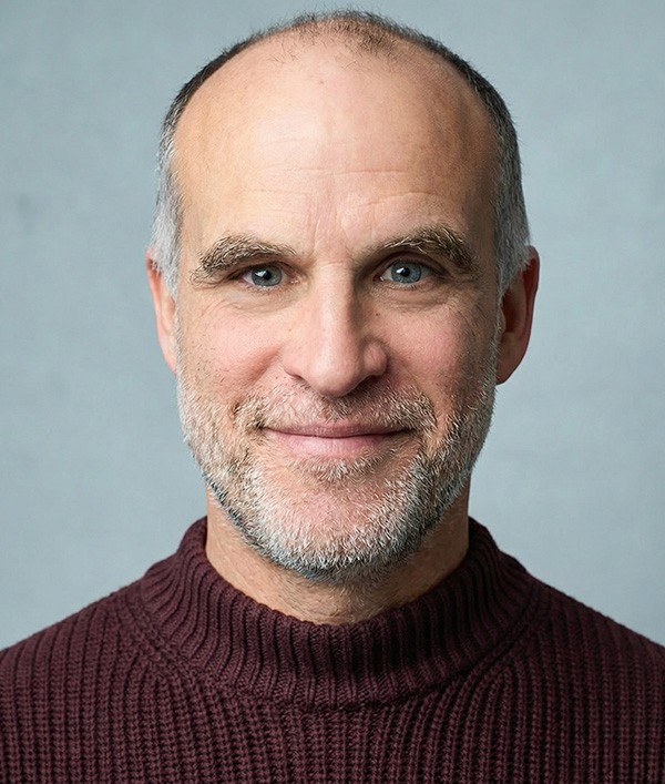 white Beats by Dr. Dre headphones on mid air