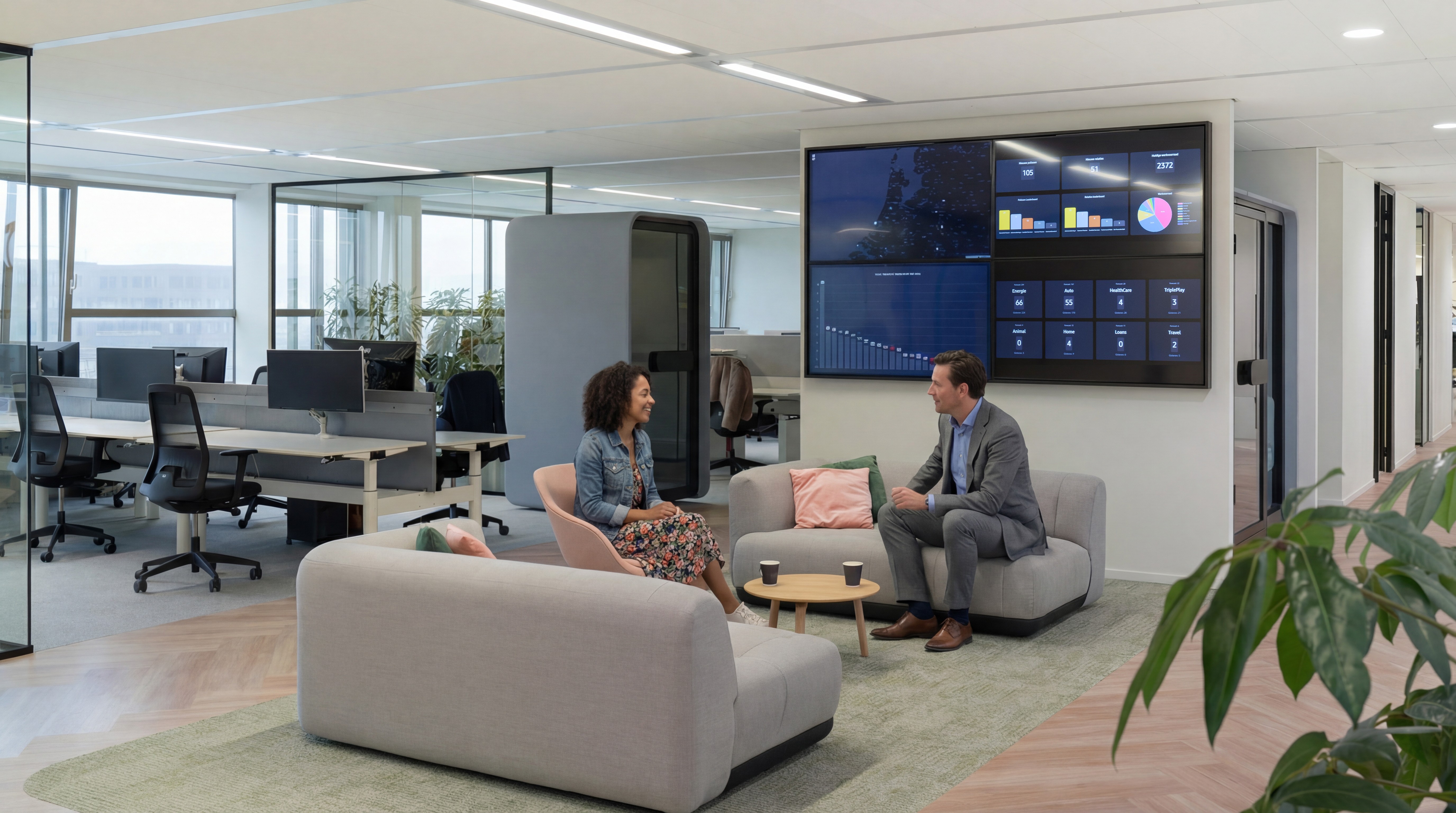 Image of two people discussing