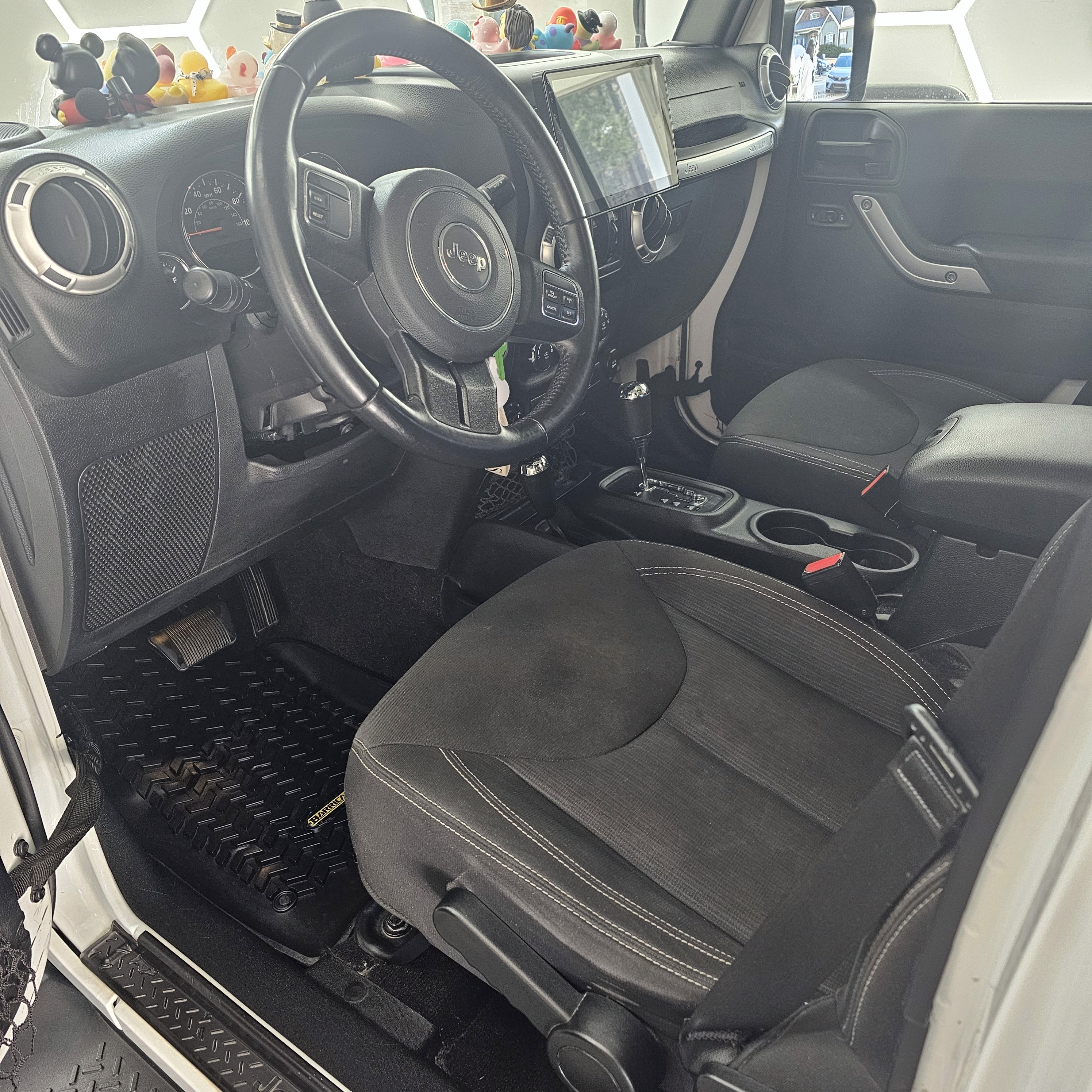 Full, complete detail on a 2015 Jeep Wrangler on-site in Buckhead.