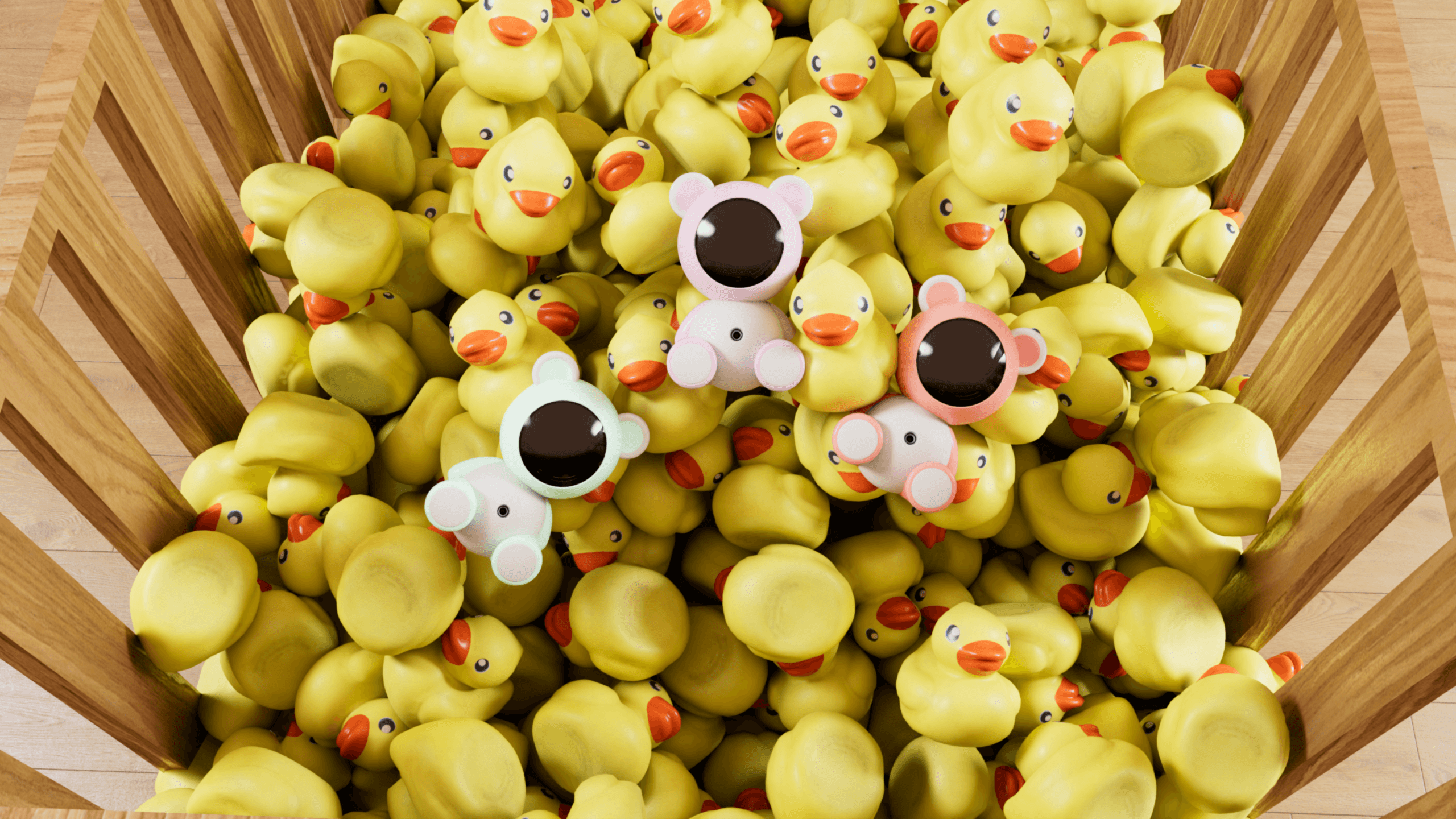 3 cub watches on top of pile of duck toys in cradel 