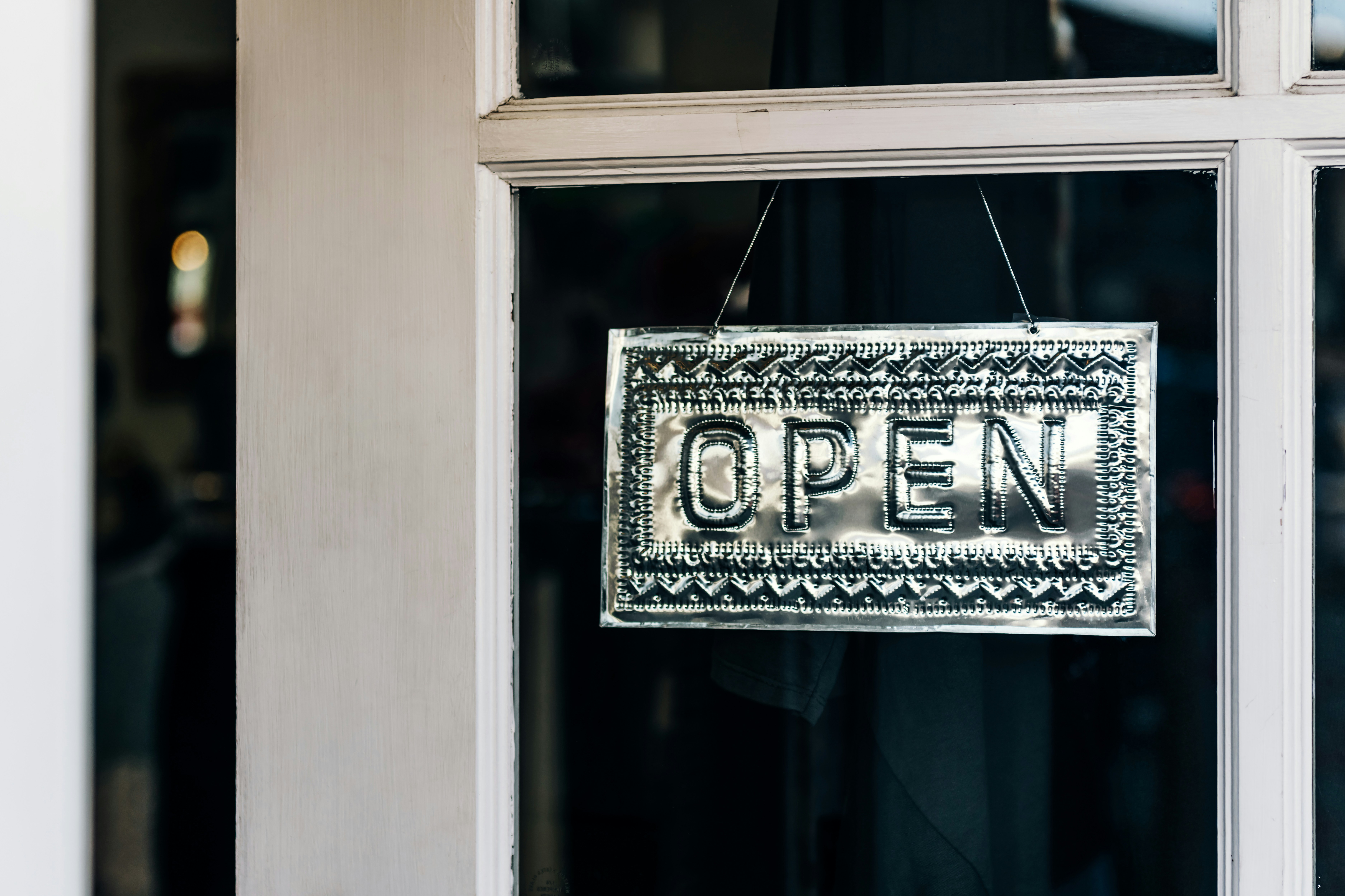 A Door with Open sign - Marketing Automation Tools for Small Business