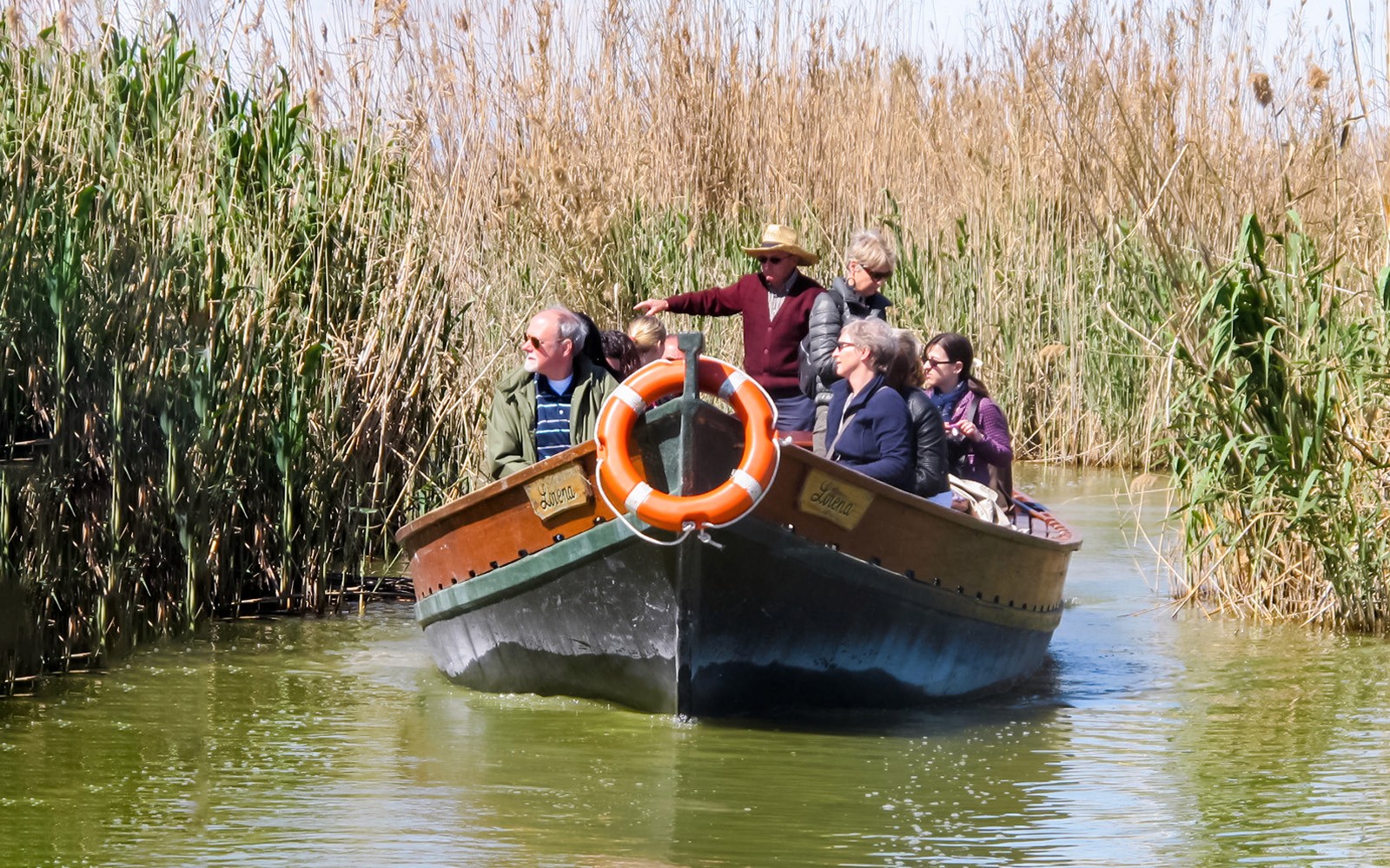 Boat ride through reeds at Albufeira Natural Park.