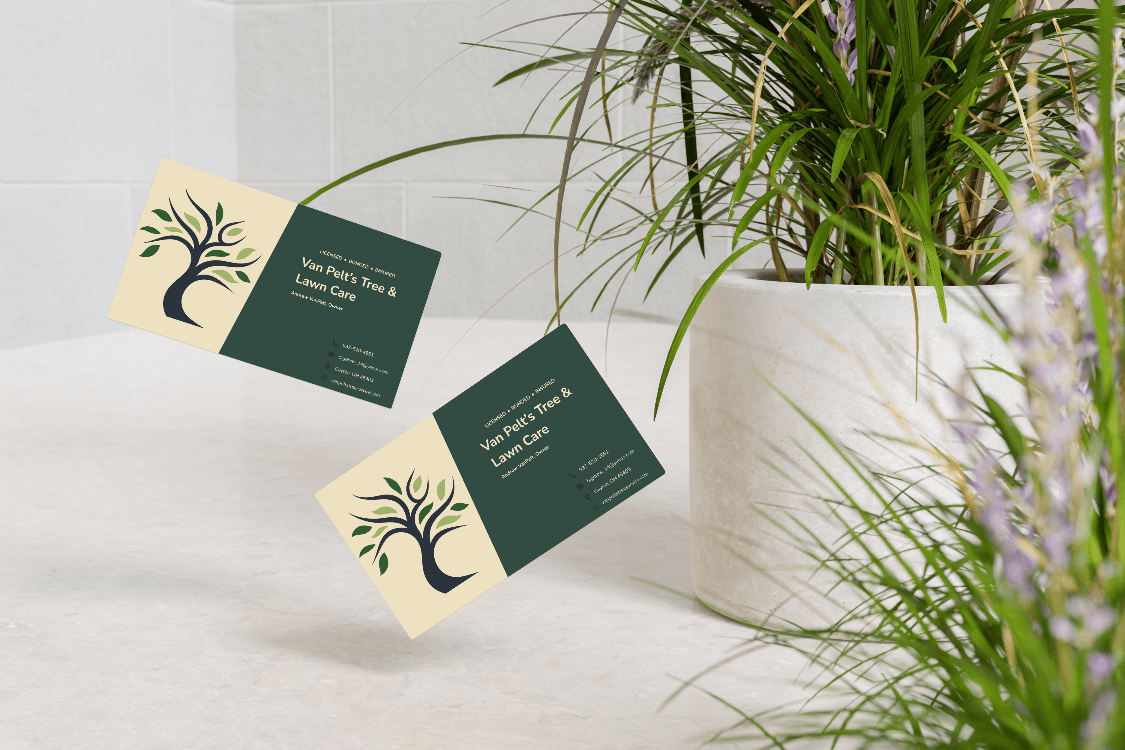 Top-down view of a bowl of white foaming cleanser with airy bubbles on a minimal surface.