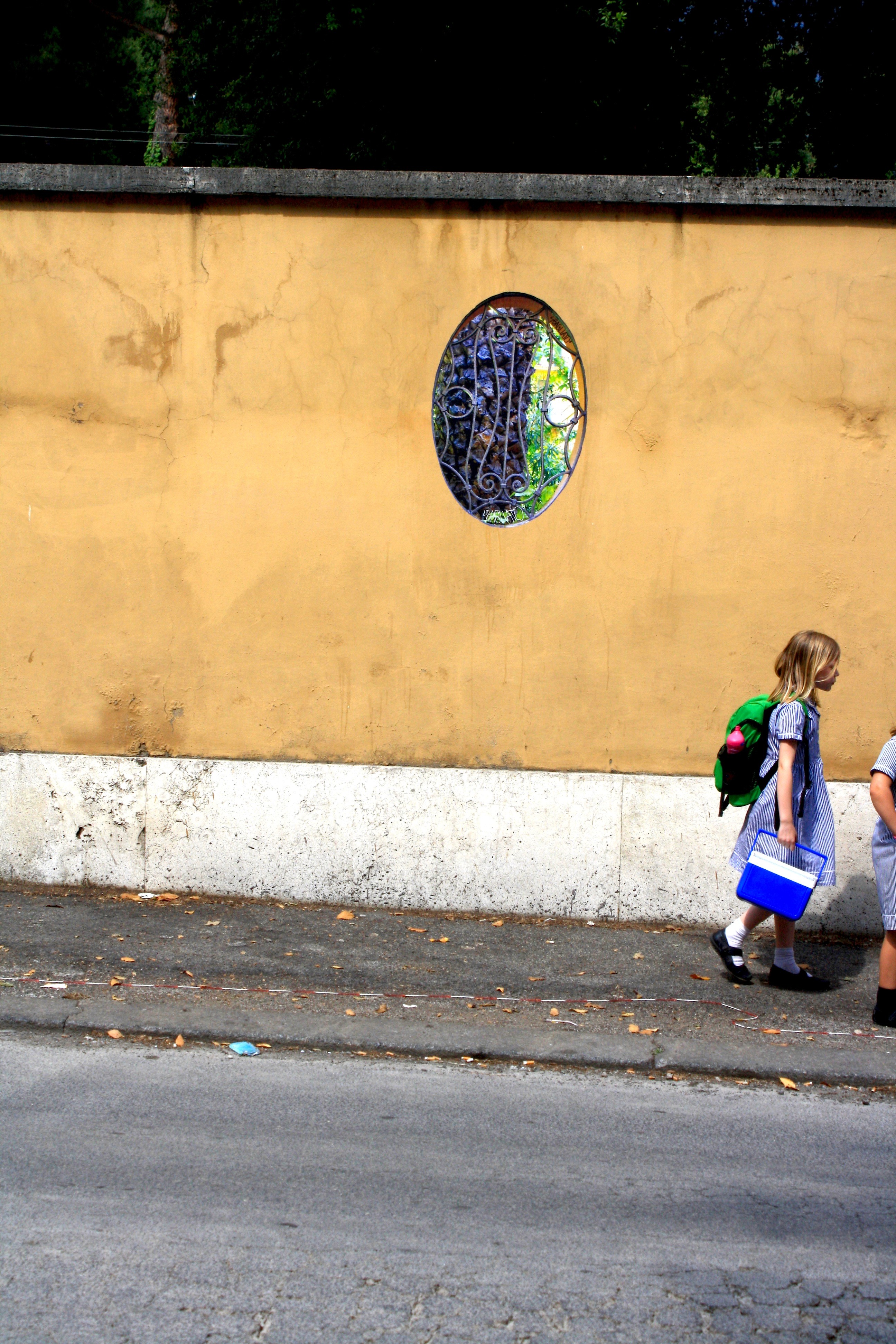 Collage on wall, Rome 2011
