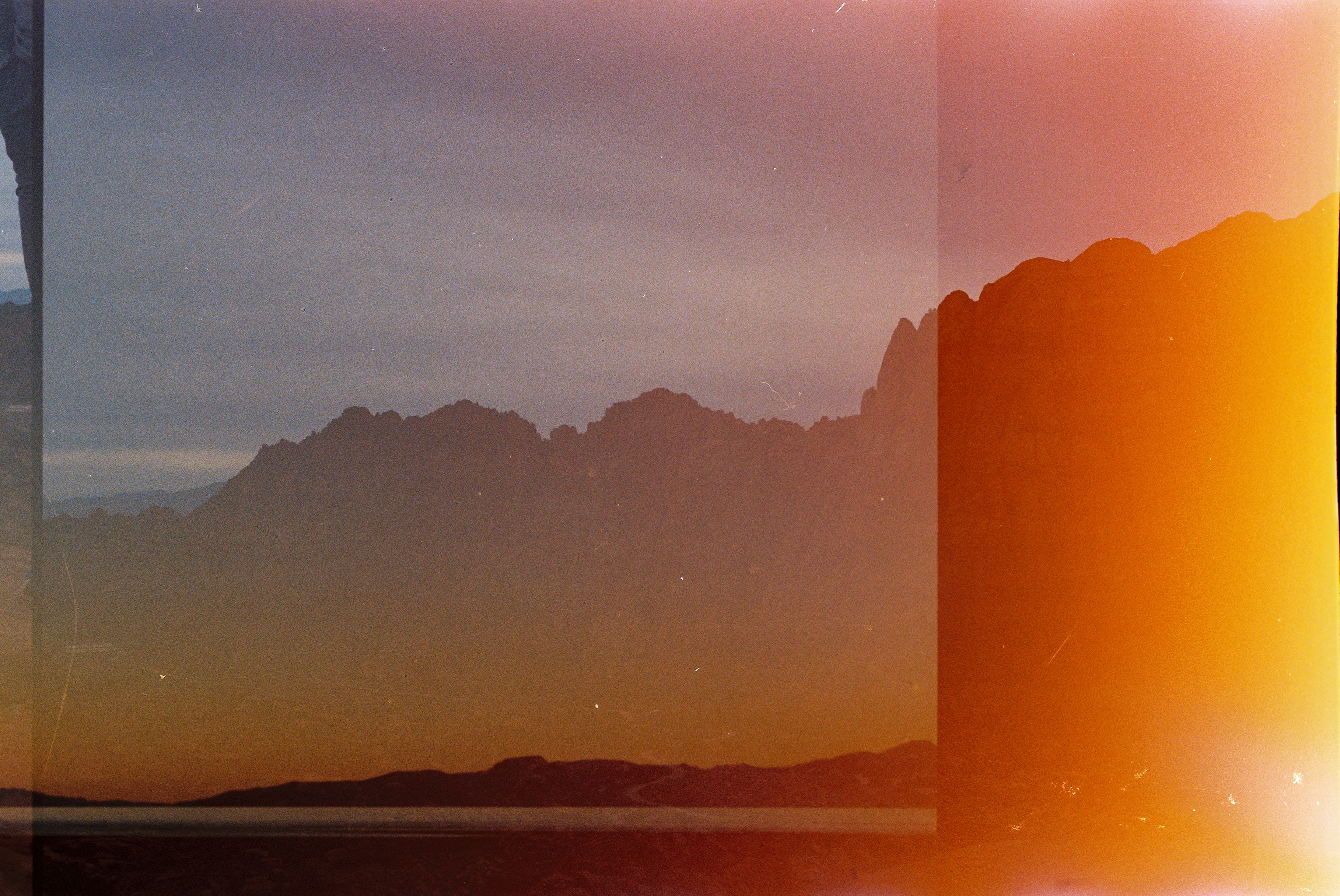 double exposure of red rocks and salt flats