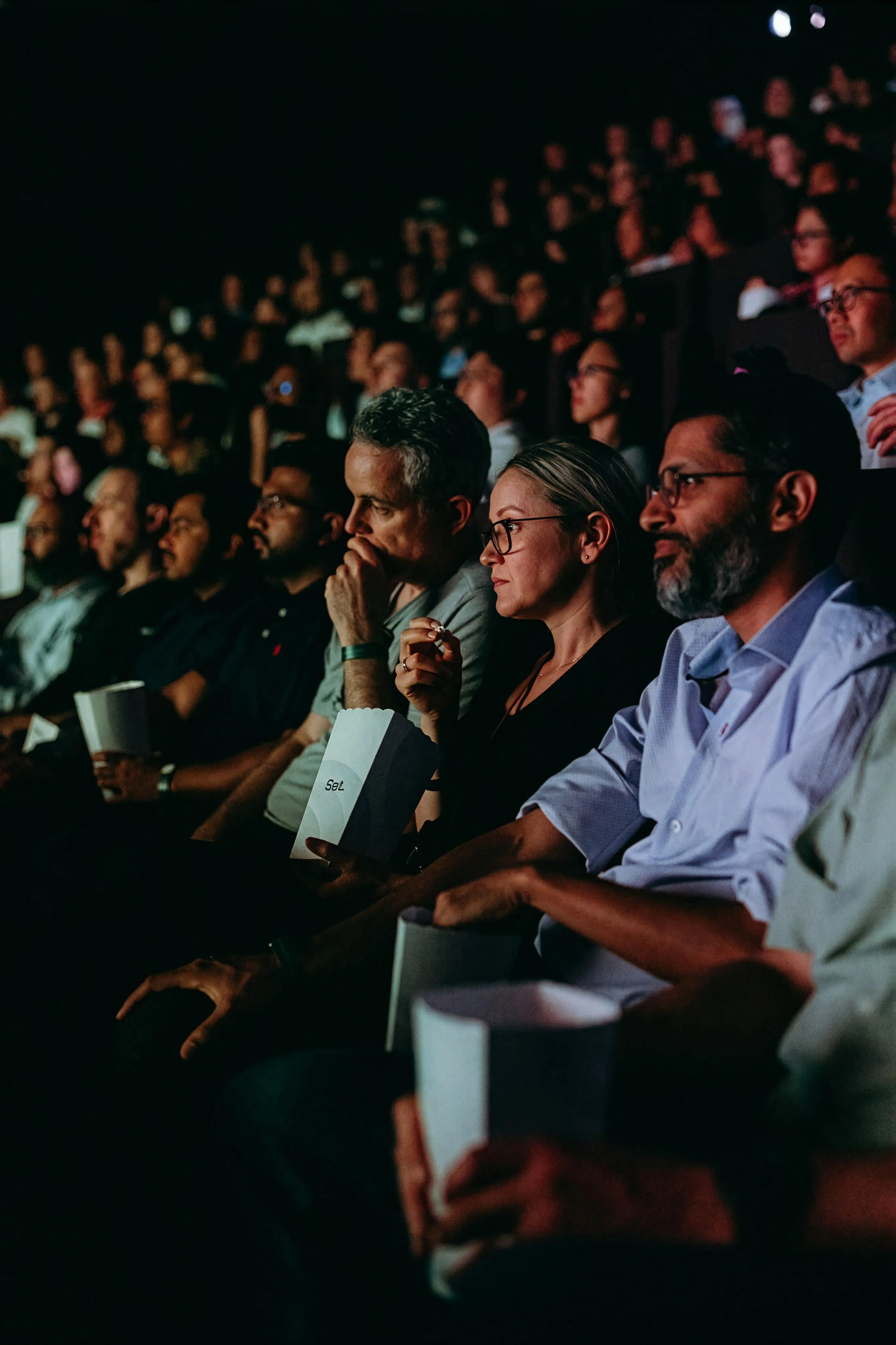 Flexiti team members watching a presentation