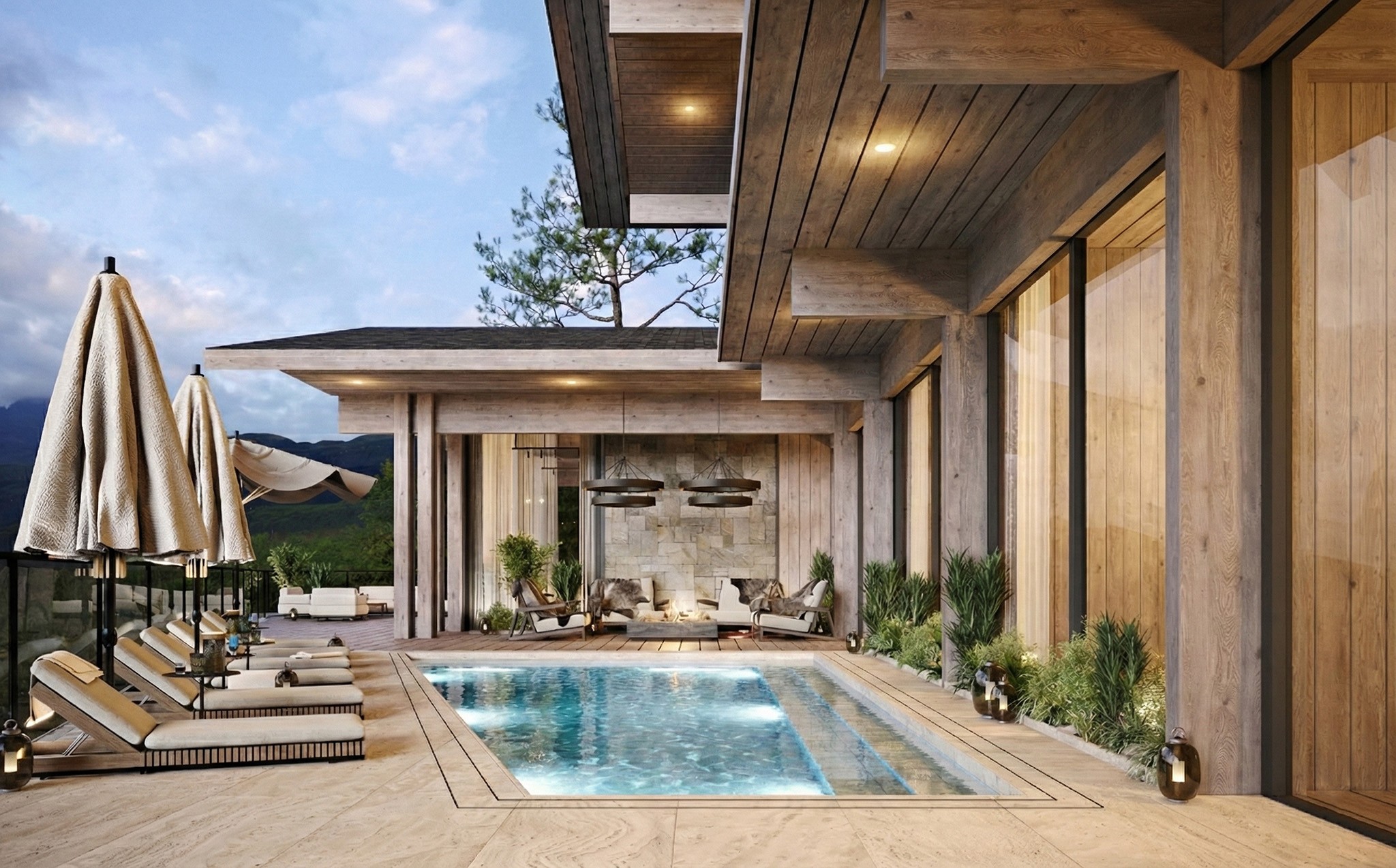 Peakside Chalets Cyprus pool courtyard with timber-clad architecture, sun loungers, and mountain views