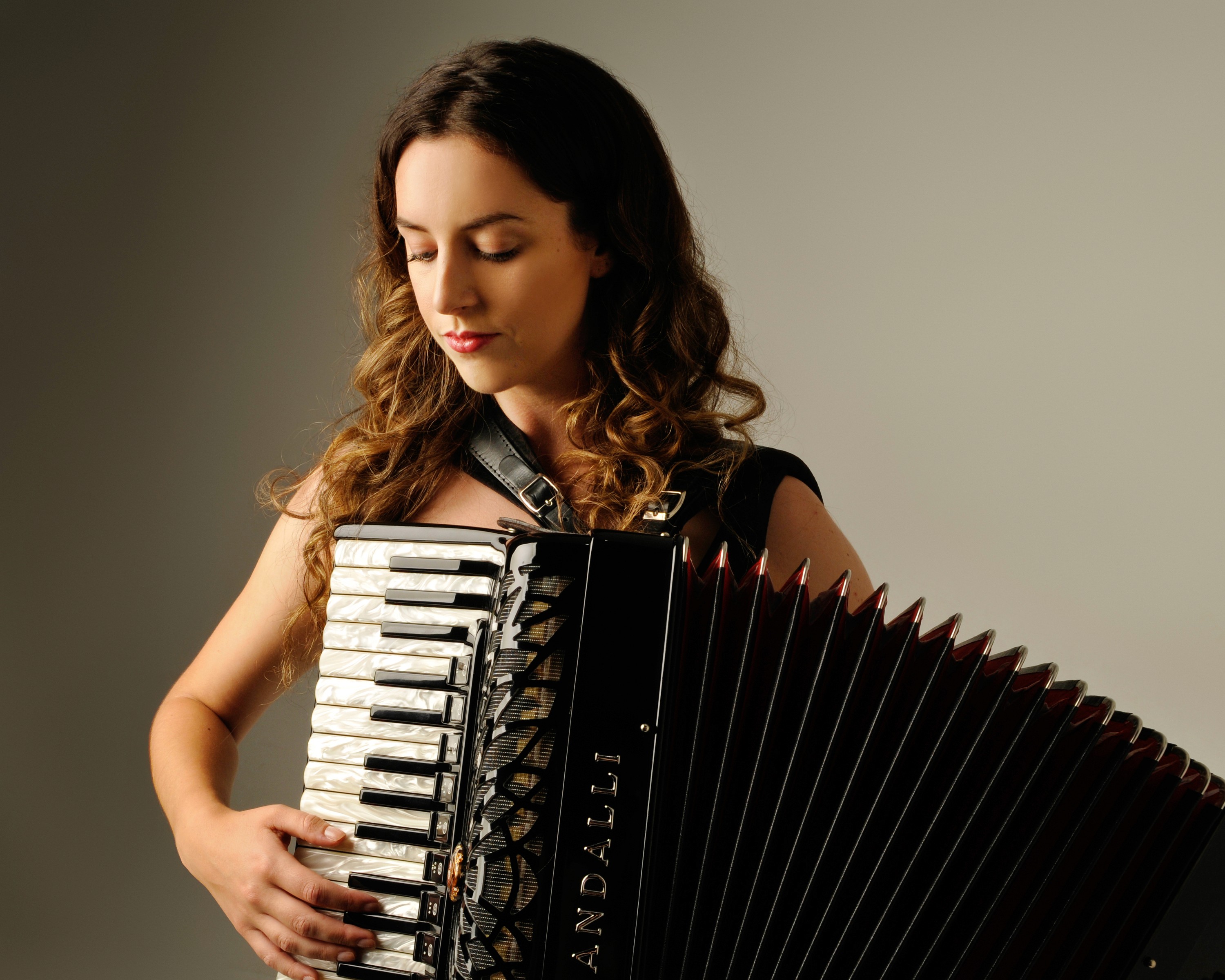 Lucy performing her accordion.