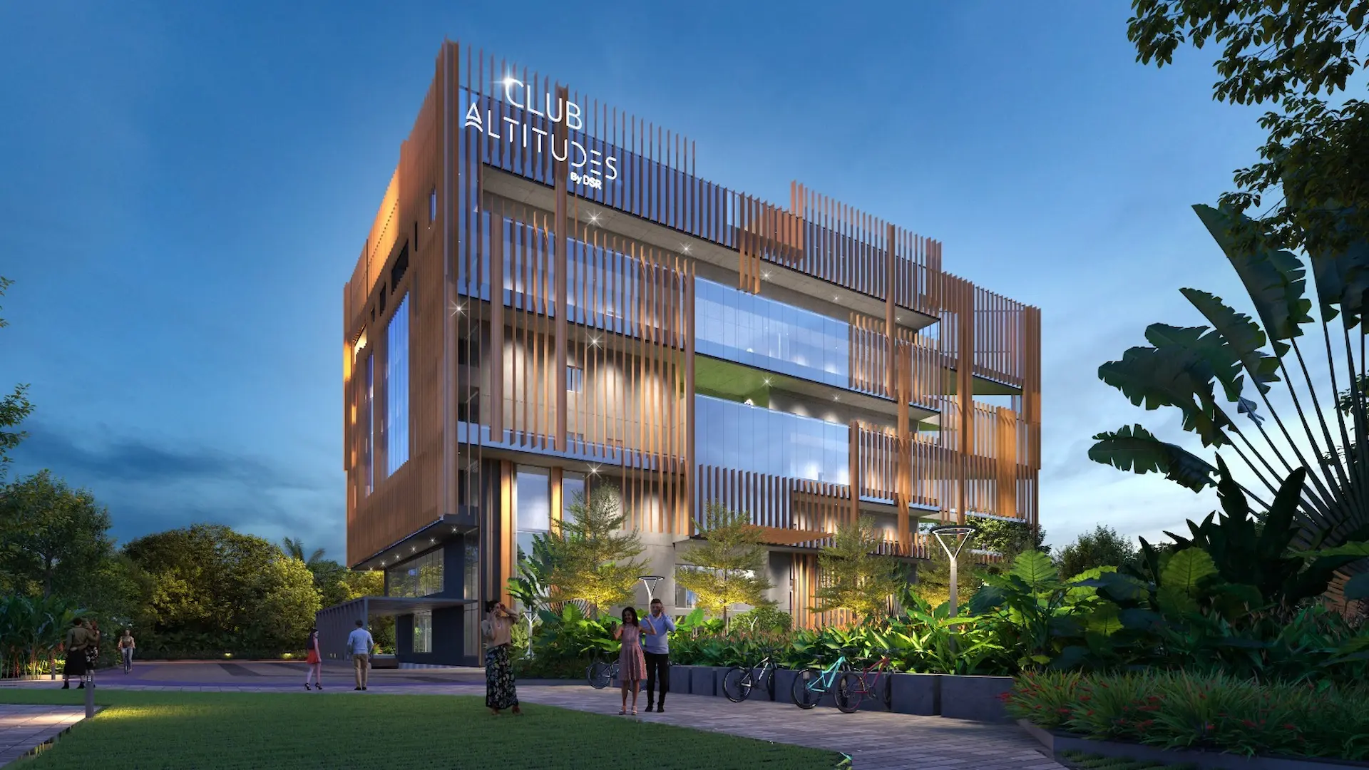 Two people sit across a table in a stylish room with red velvet walls and a large red pendant light. The mood is intimate and modern.