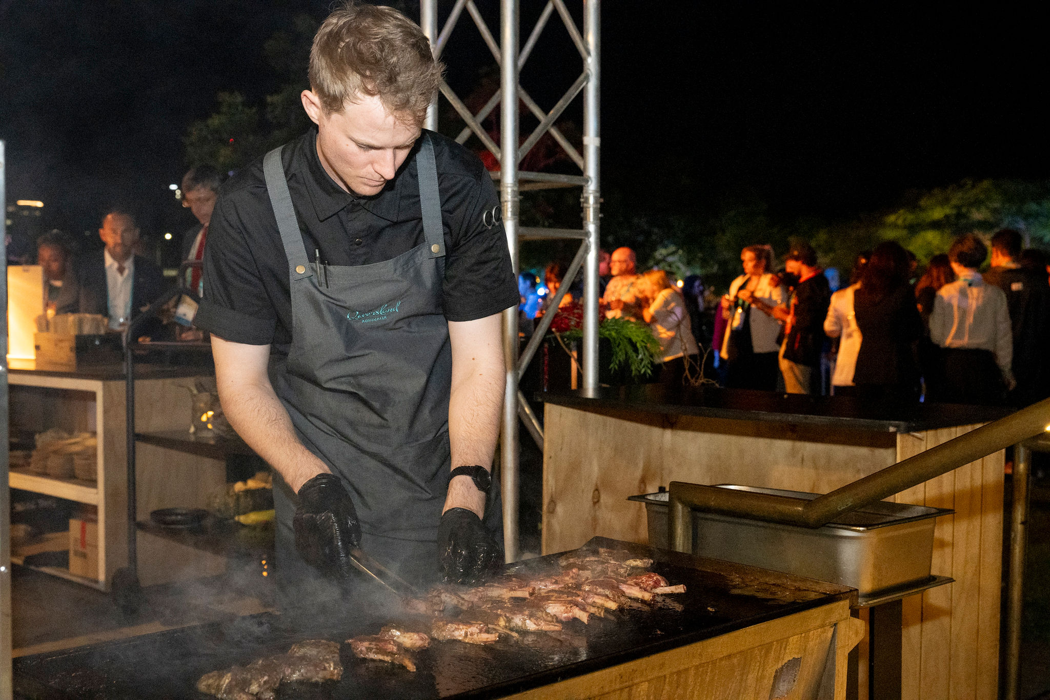 Tom Hitchcock cooking at the 'On the Barbie' station