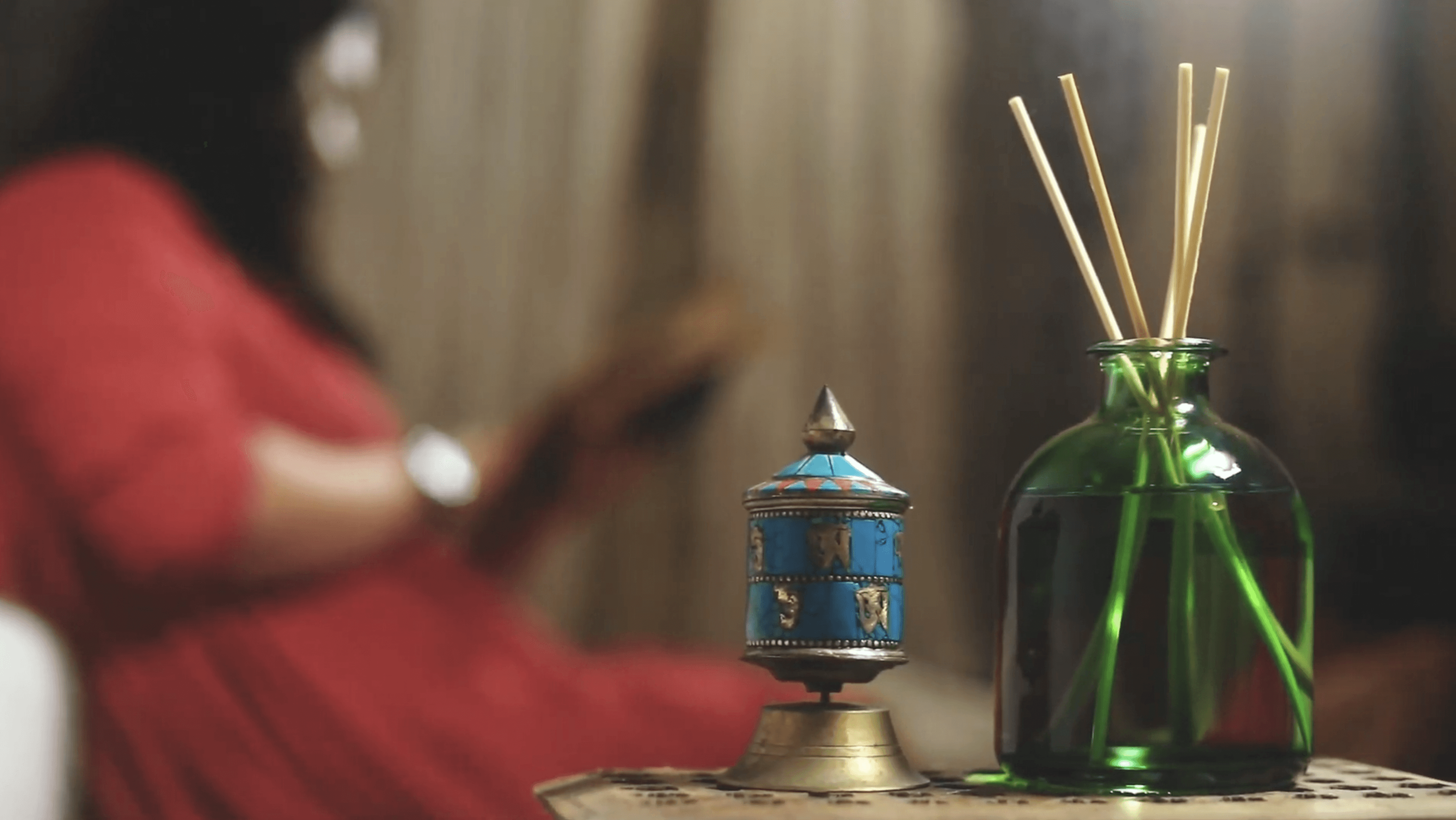 Animated scene showing women in a village discussing livelihood opportunities and government work programmes.