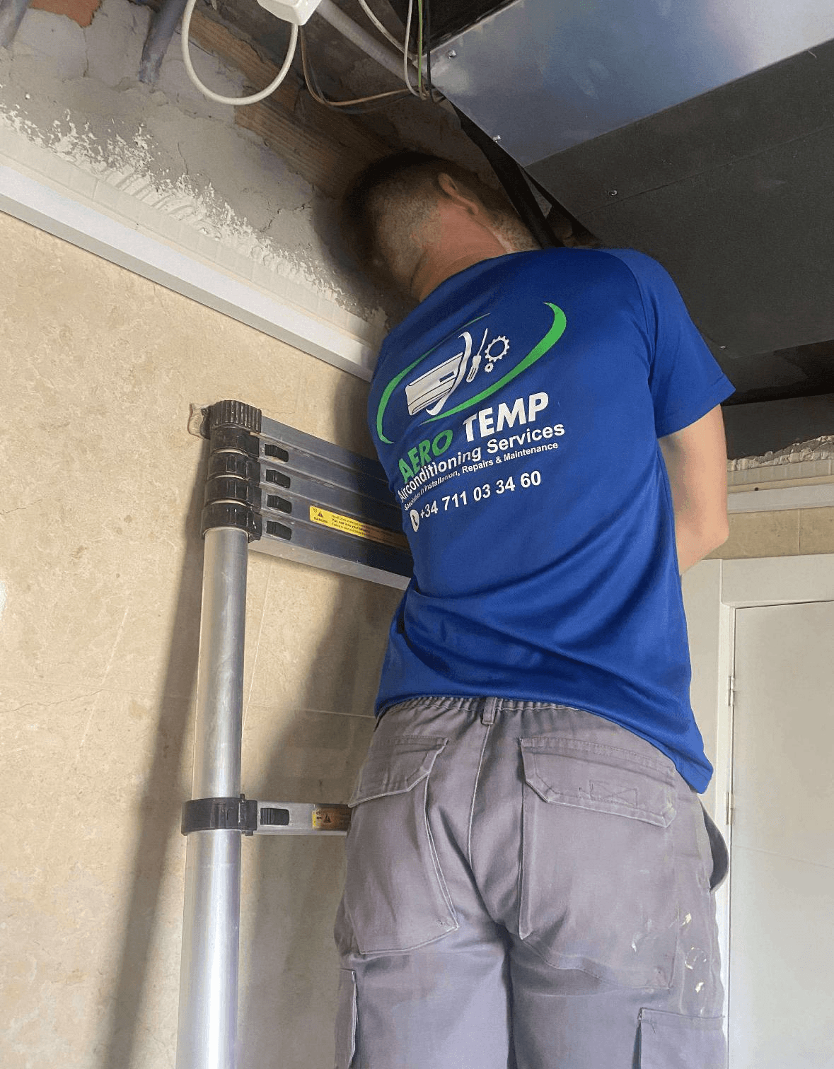 Aerotemp HVAC technician installing air conditioning system in Costa del Sol