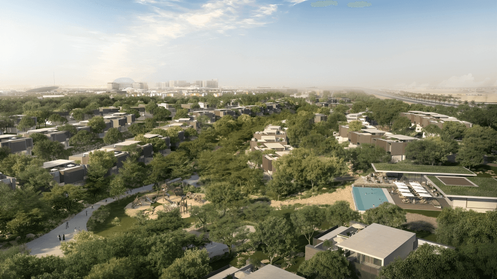 Aerial view of Yasmina Villa, showcasing a modern residential development with landscaped gardens and homes.