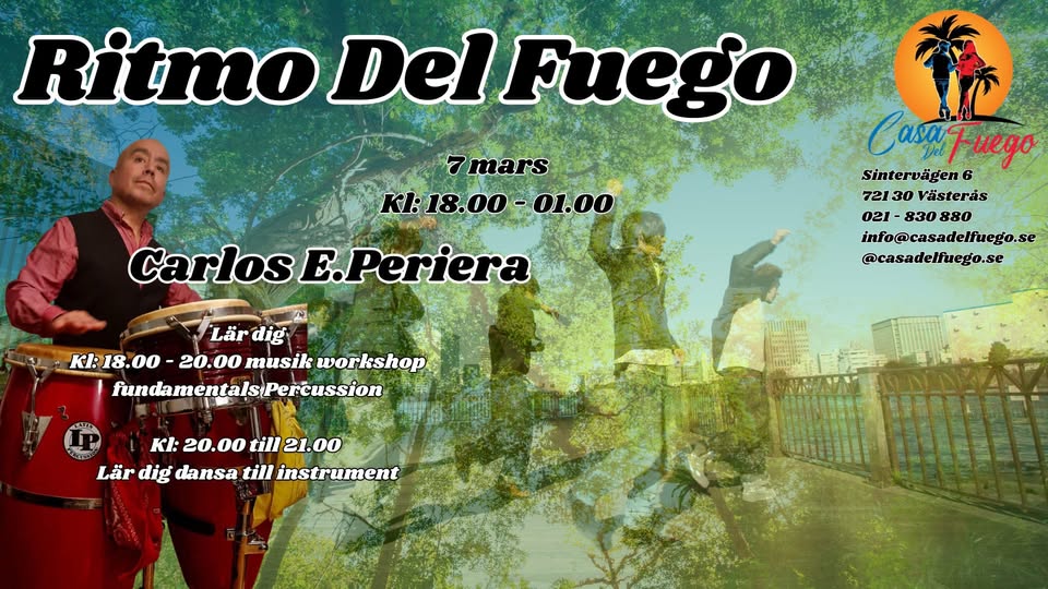 Orange bicycle parked near graffiti wall.