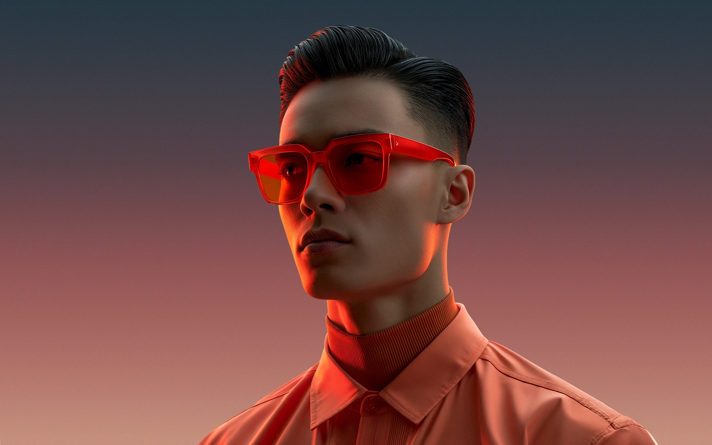 Man with sharp, slicked hair wearing bright red sunglasses and a collared shirt against a warm gradient twilight sky.