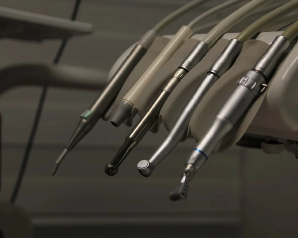 a person's mouth with teeth showing