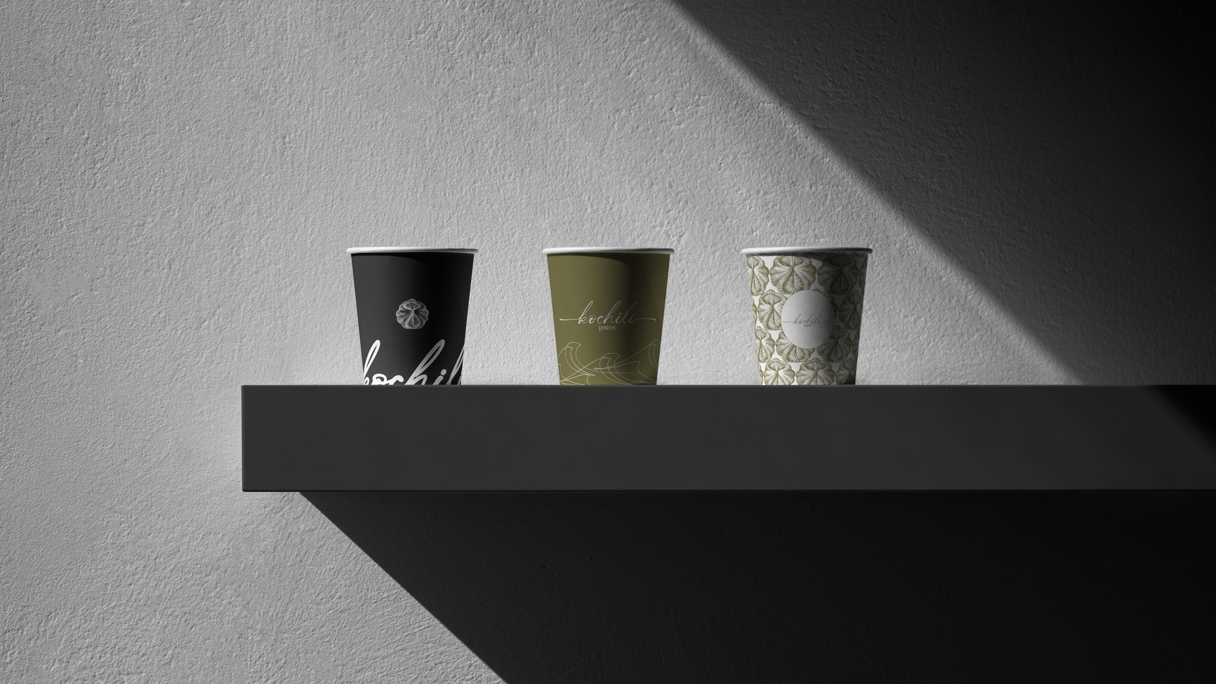 Three slim, upright orange packaging boxes side by side, each showing a partial black smiley face and “Smiley Co” text on the top, with a matching orange background.