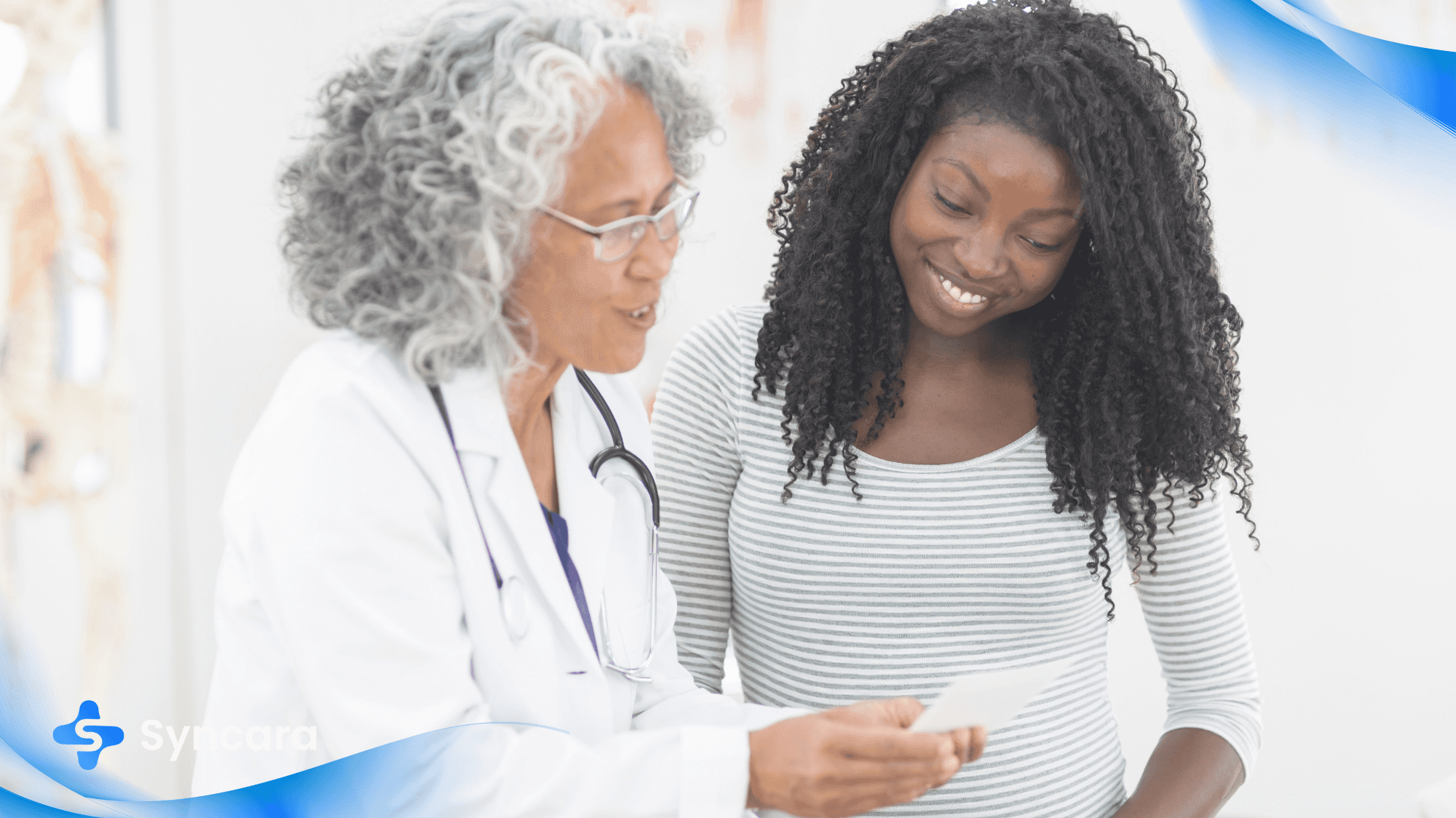 Doctor and patient discussing health concerns during a walk-in clinic visit in Ontario.