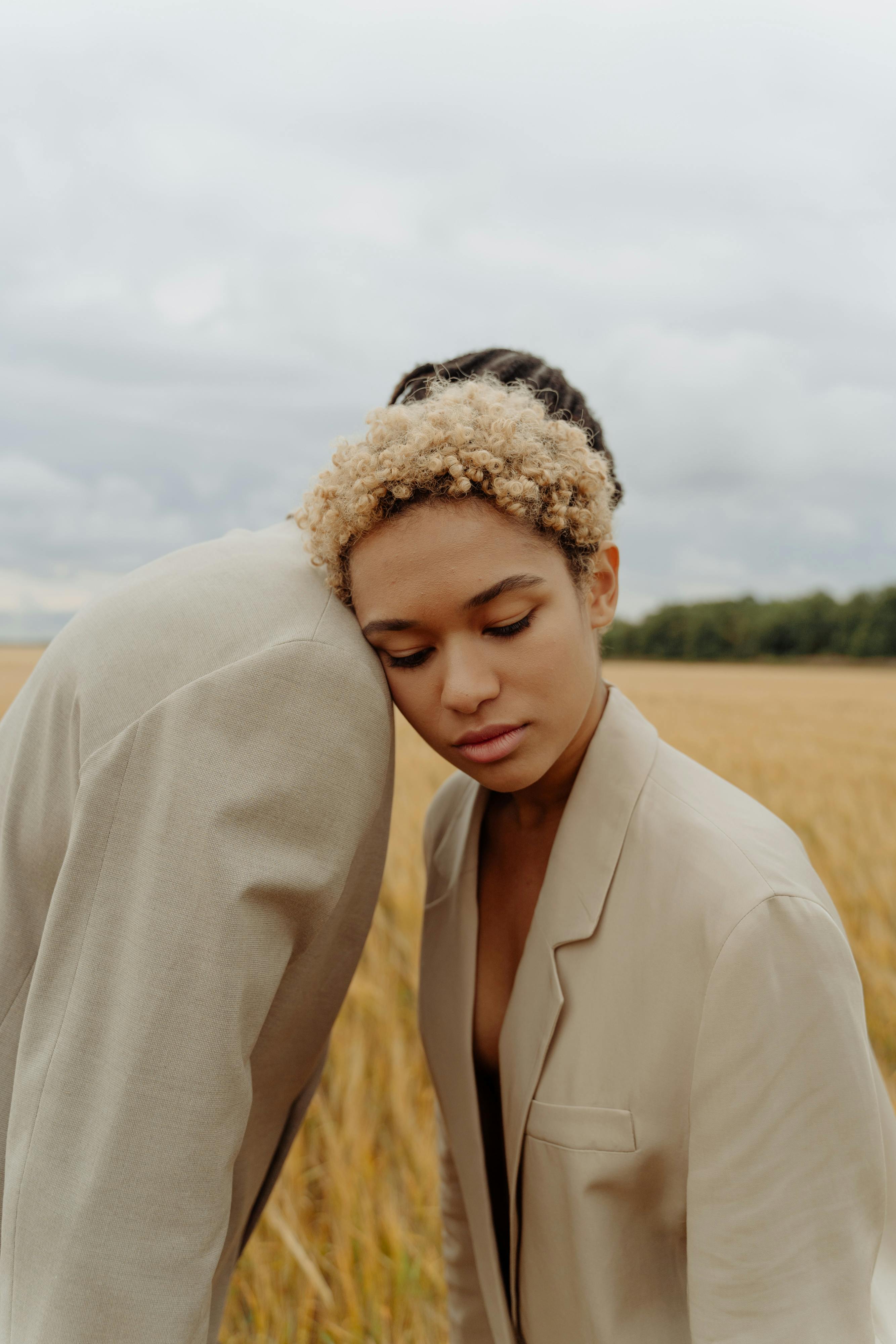 Man and woman hugging in a field