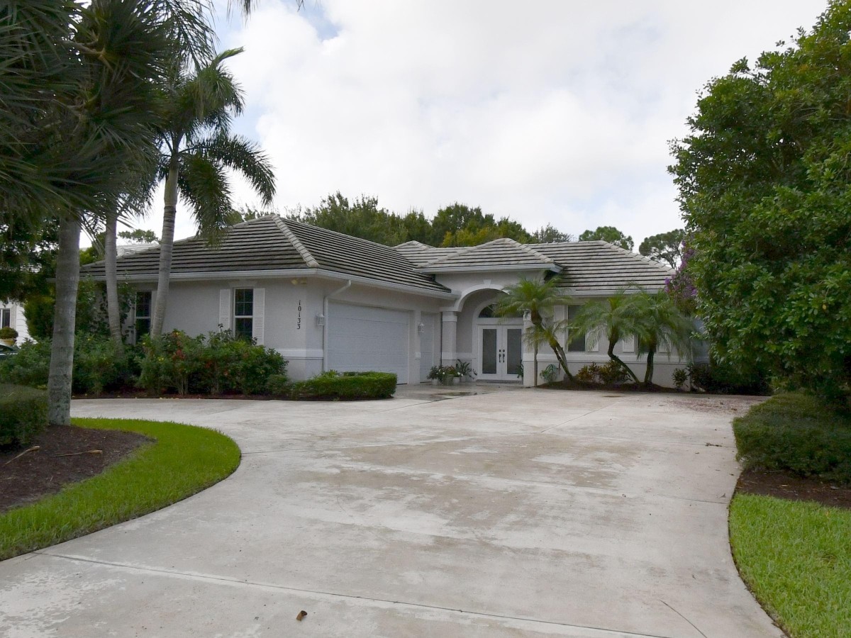 2002 Original Roof in Calloway Place, PGA Village, Port St Lucie with Entegra Flat Smooth Tile in Natural Gray