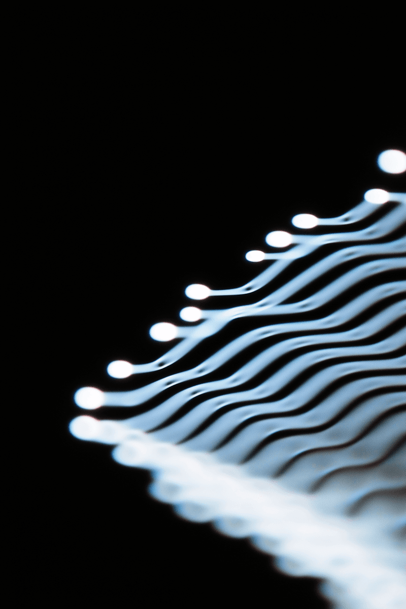 body of water near gray rock