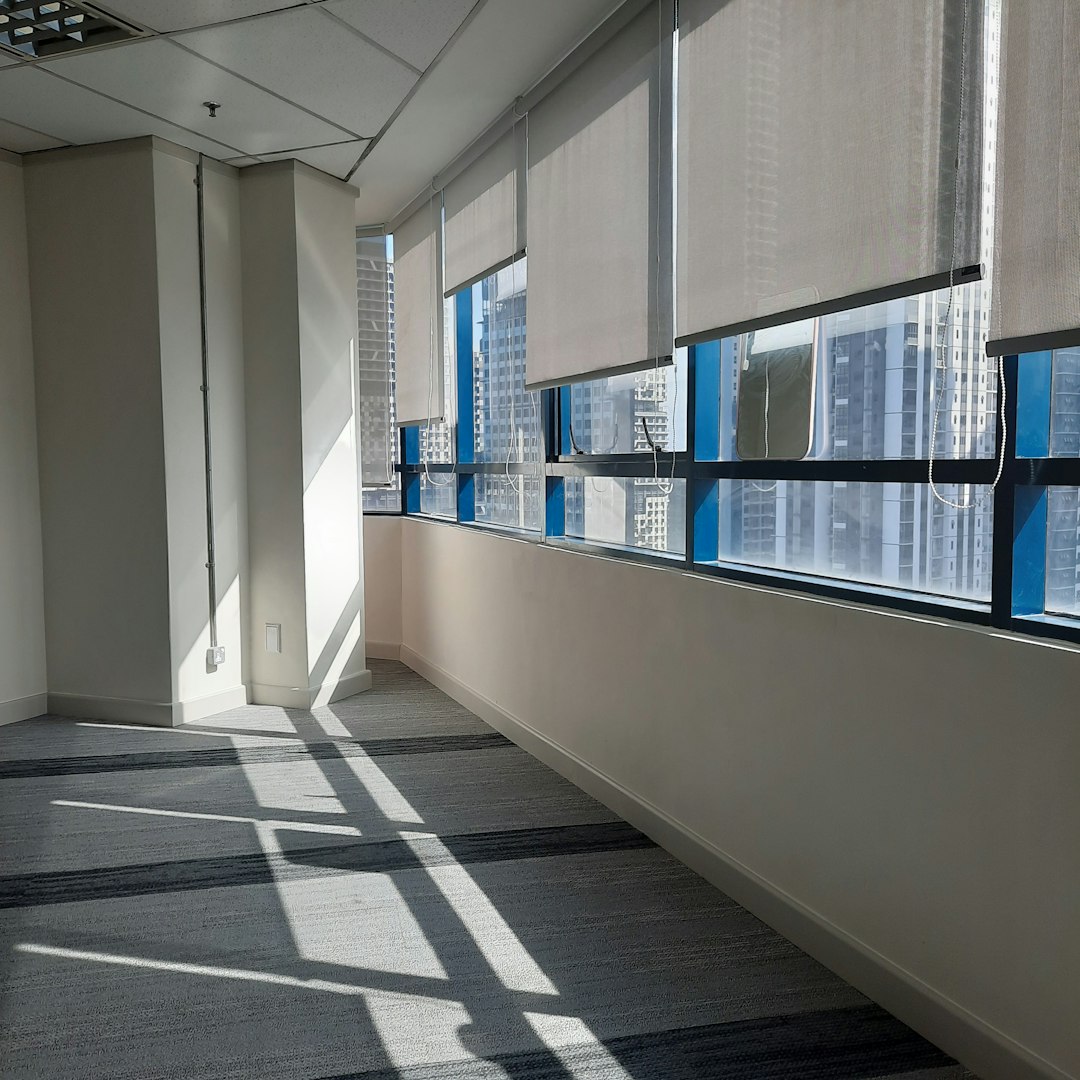 A modern bedroom with a stylish, neutral aesthetic.