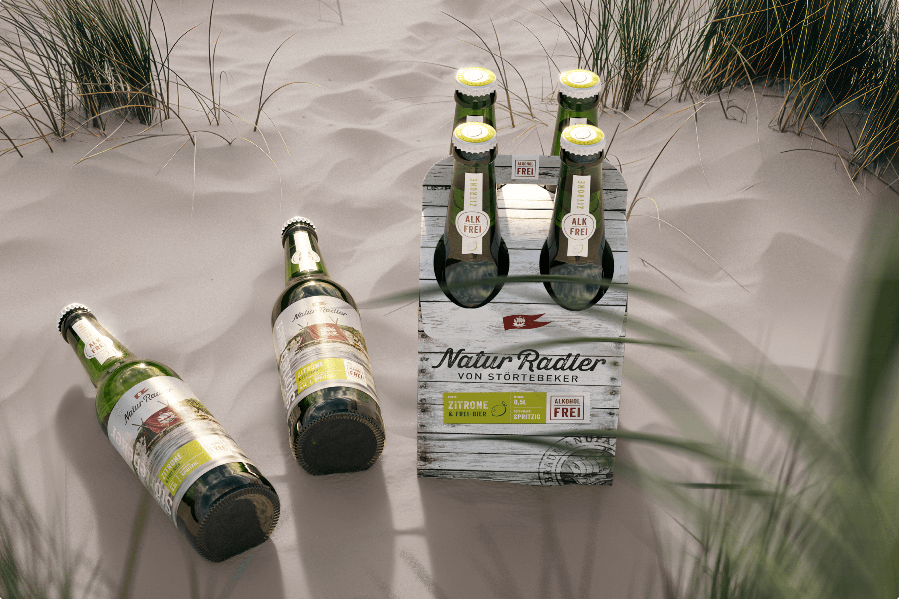 Four bottles of Störtebeker Natur Radler on sand dunes.