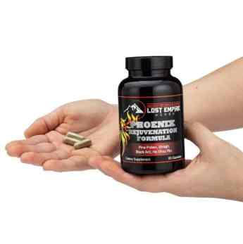 a hand holding a bottle of nail polish