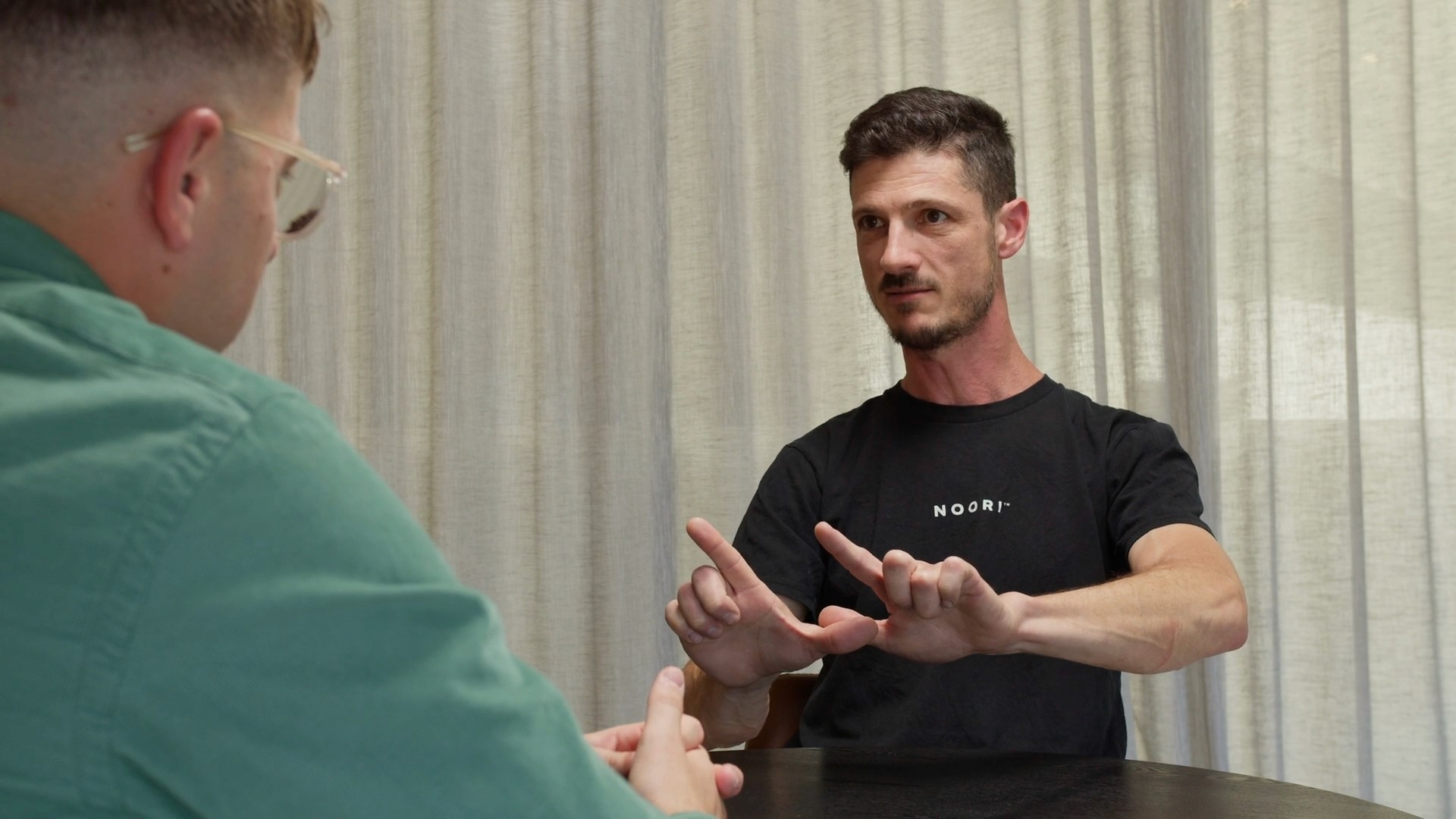 Two people discussing an architectural concept