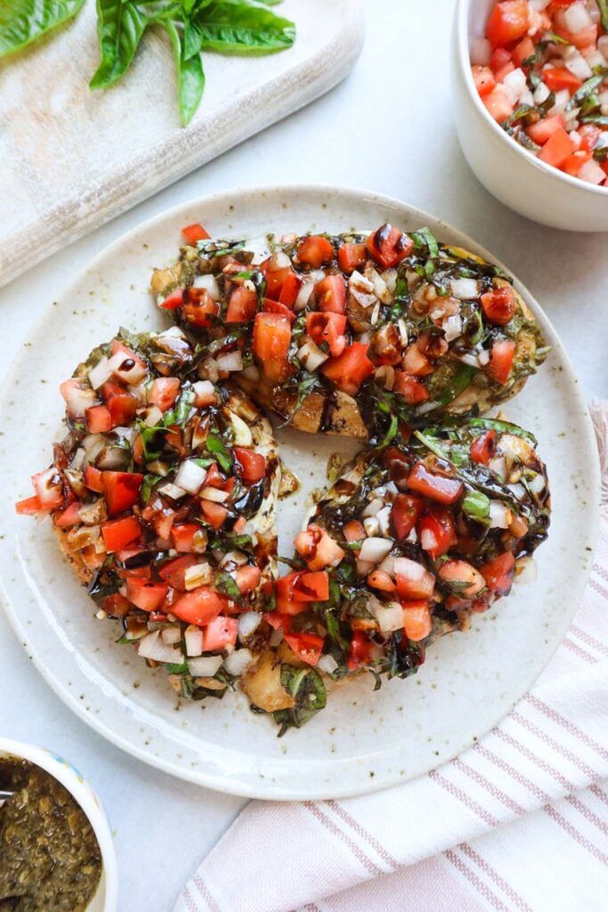 Bruschetta al Pomodoro from PASTA 9 Toronto, toasted bread topped with fresh tomatoes, basil, garlic, and balsamic glaze for a light Italian bite.