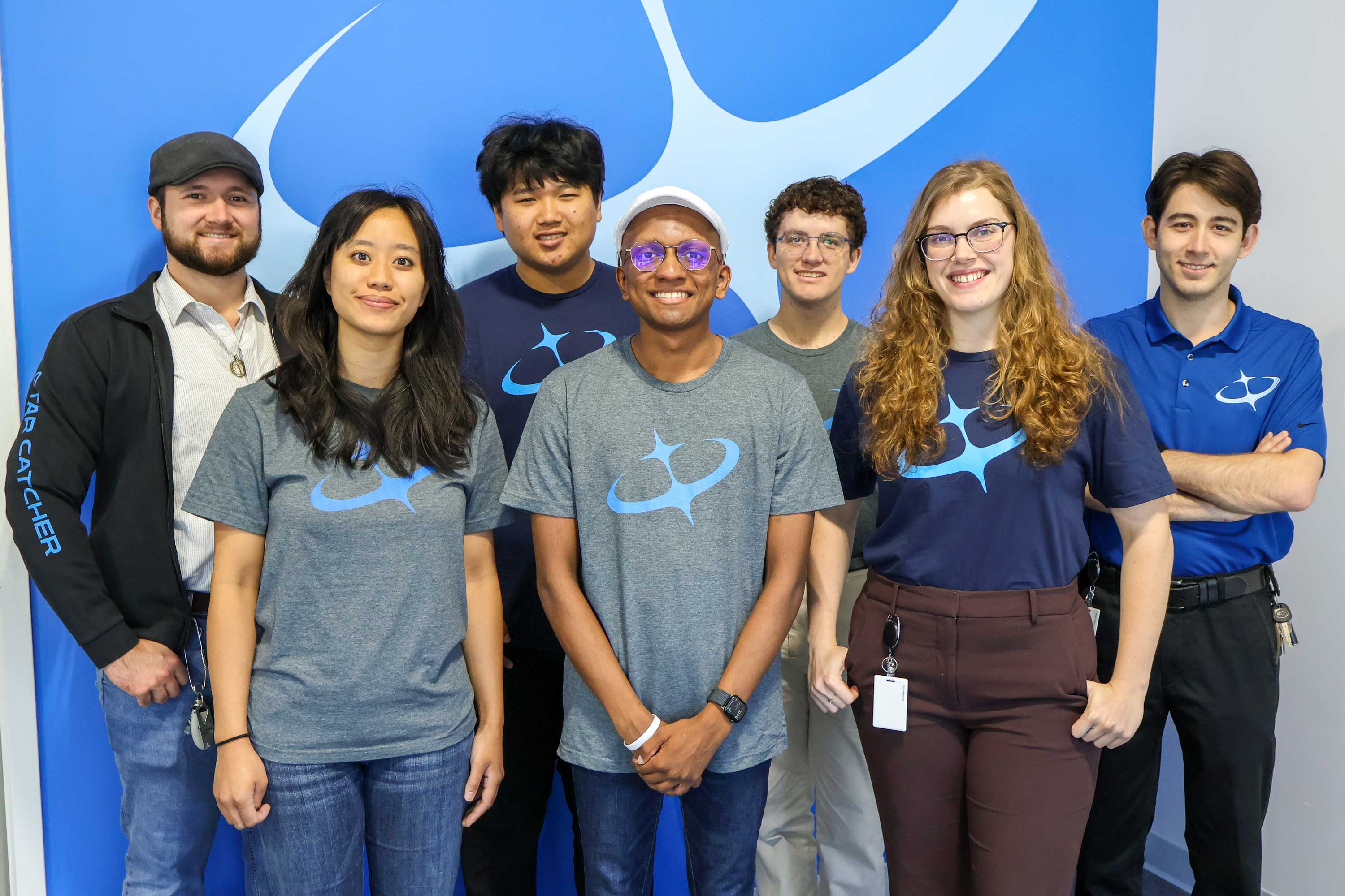 Team photo of Star Catcher interns at headquarters